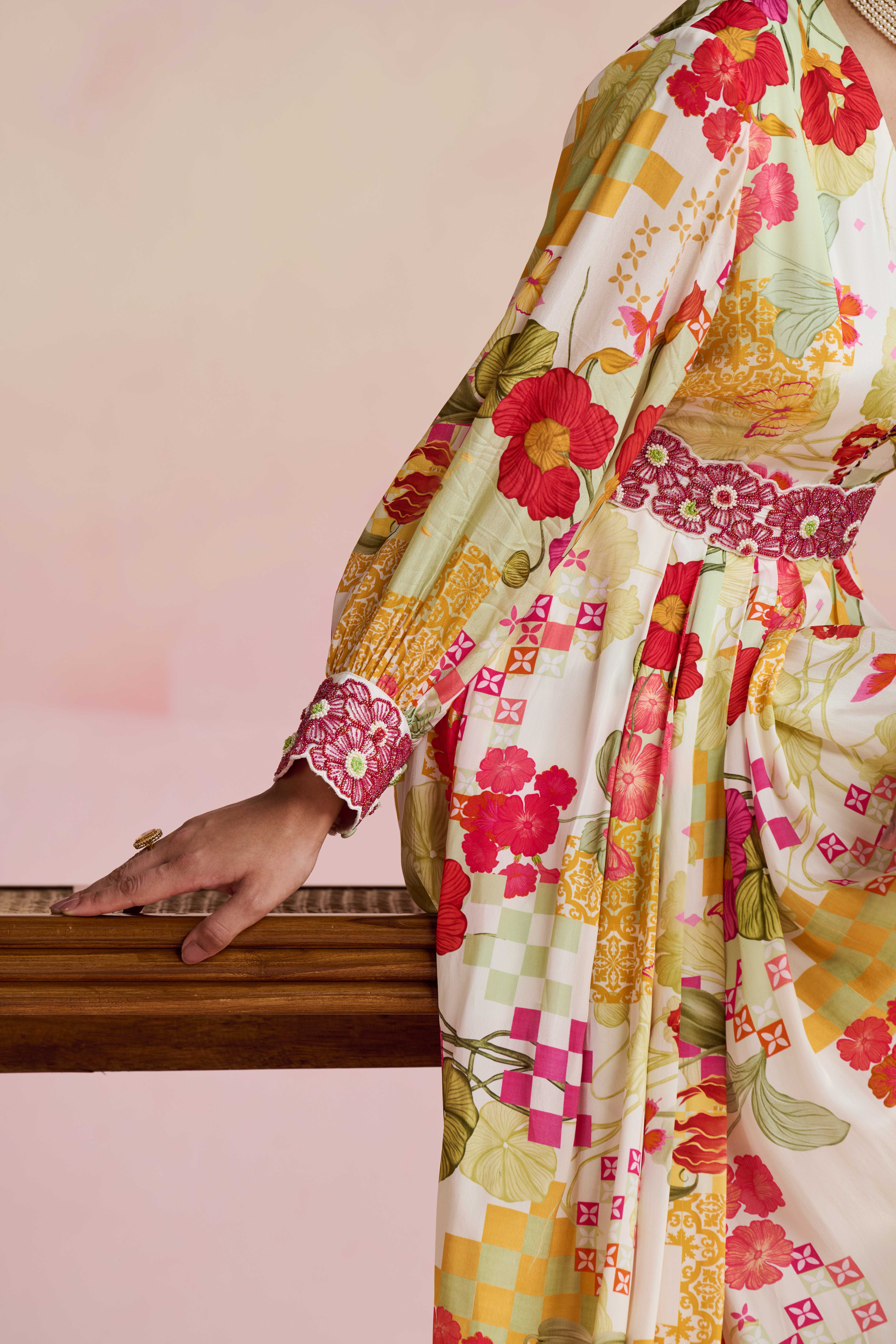 A model showcasing Veena Multi Maxi Dress by Nirvair from Nirvair's collection