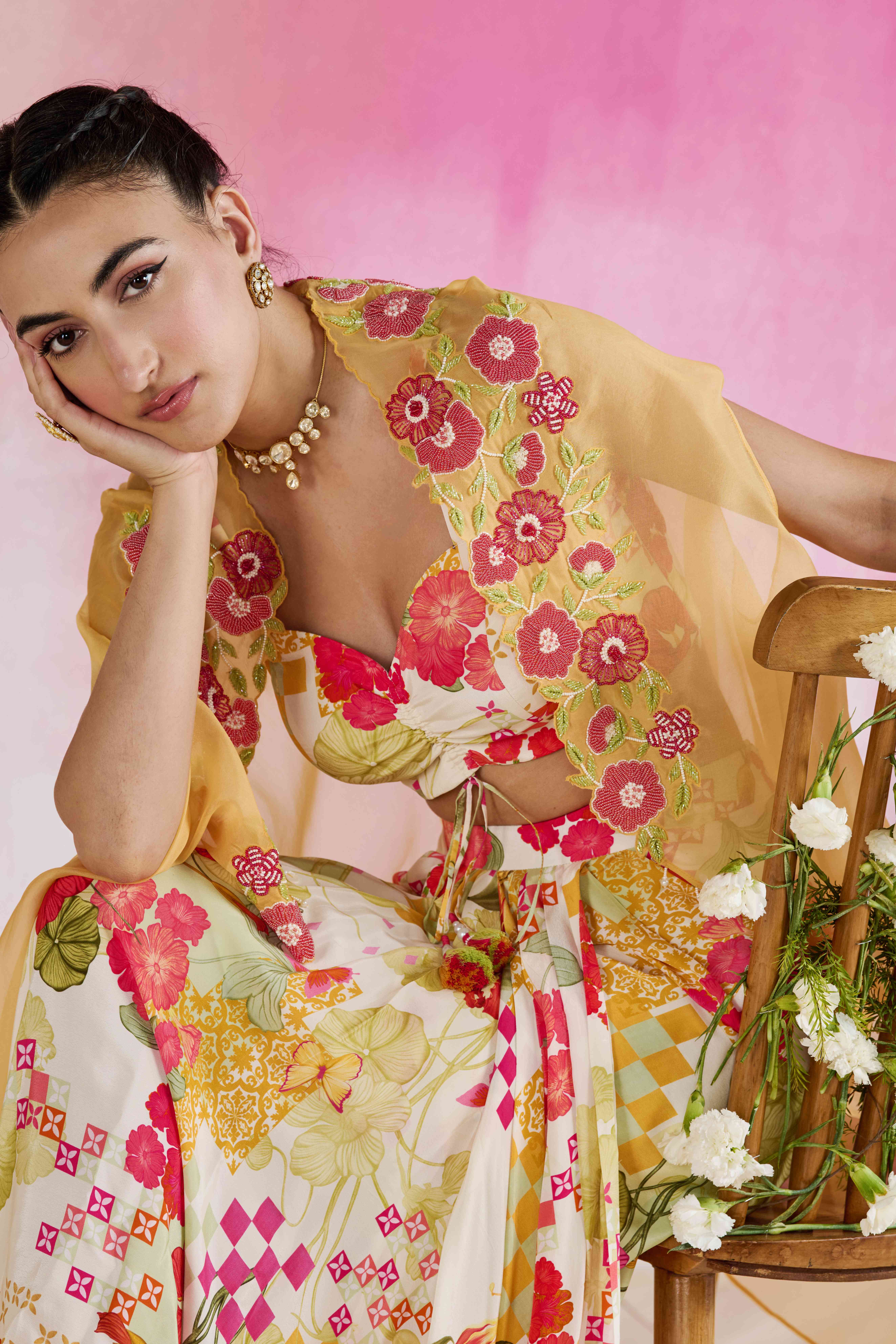A model showcasing Aarna Cape Set by Nirvair from Nirvair's collection