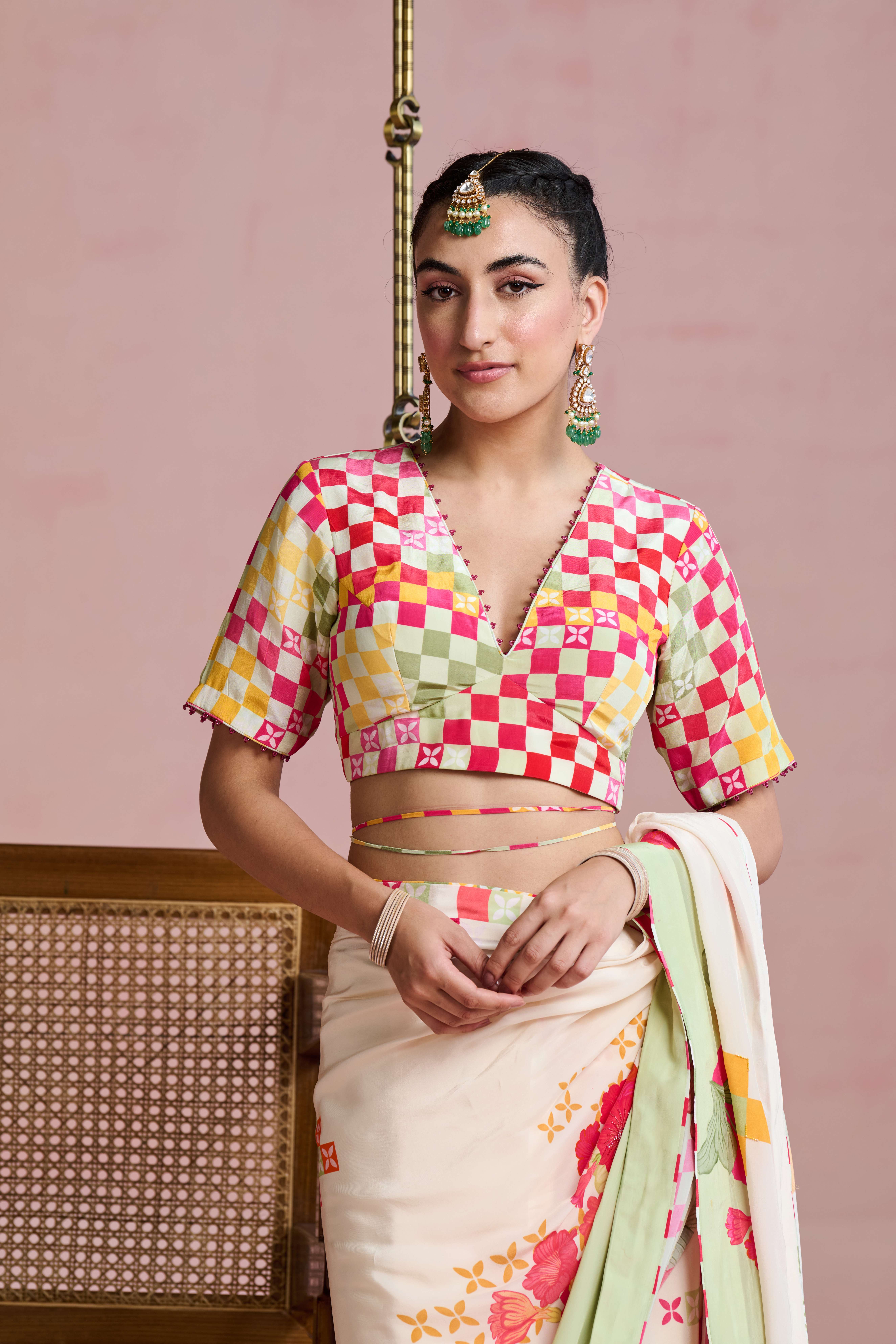 A model showcasing Urmi Drape Saree Set by Nirvair from Nirvair's collection