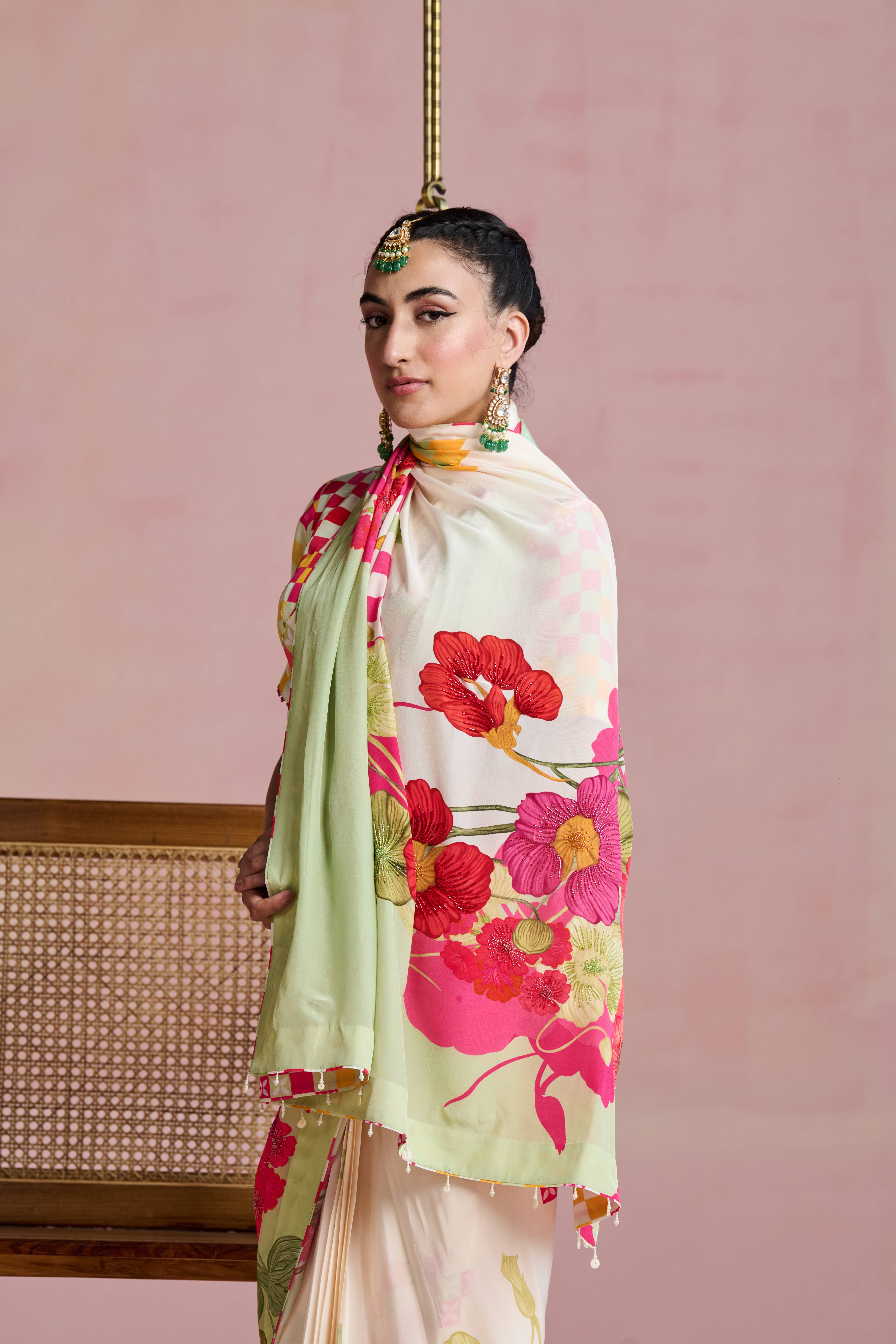 A model showcasing Urmi Drape Saree Set by Nirvair from Nirvair's collection