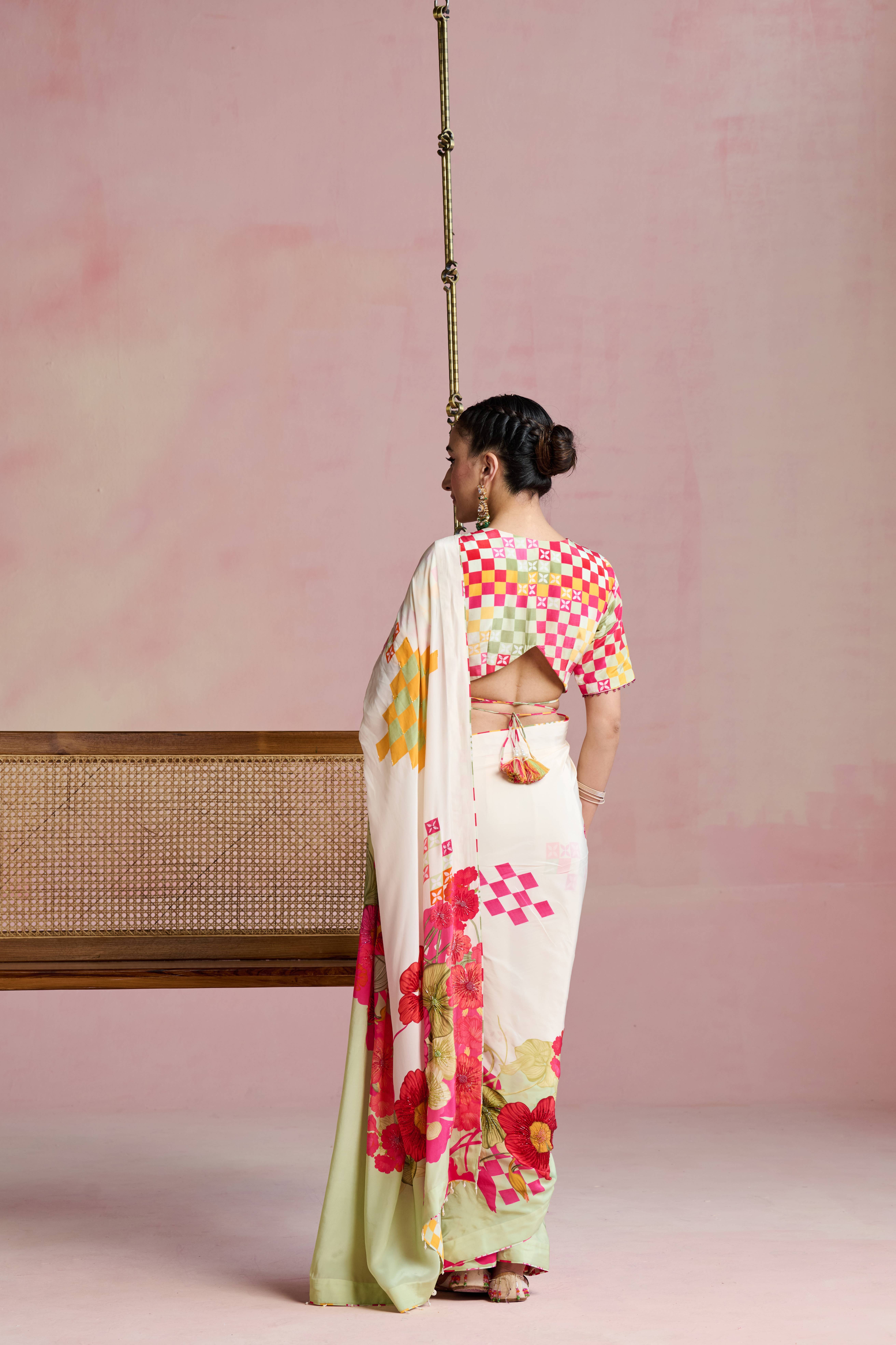A model showcasing Urmi Drape Saree Set by Nirvair from Nirvair's collection
