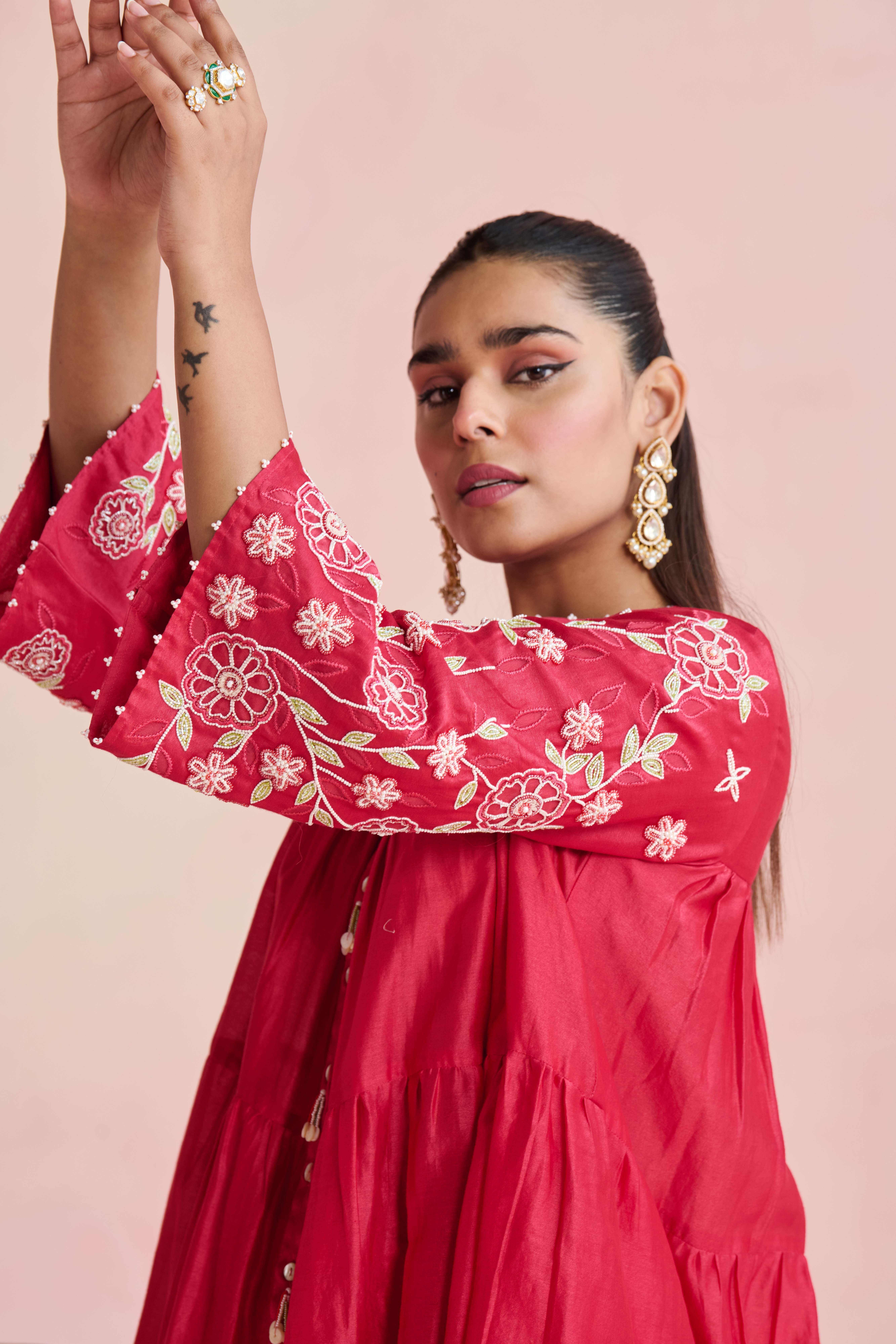 A model showcasing Niti Bright Pink Kurta Set by Nirvair from Nirvair's collection