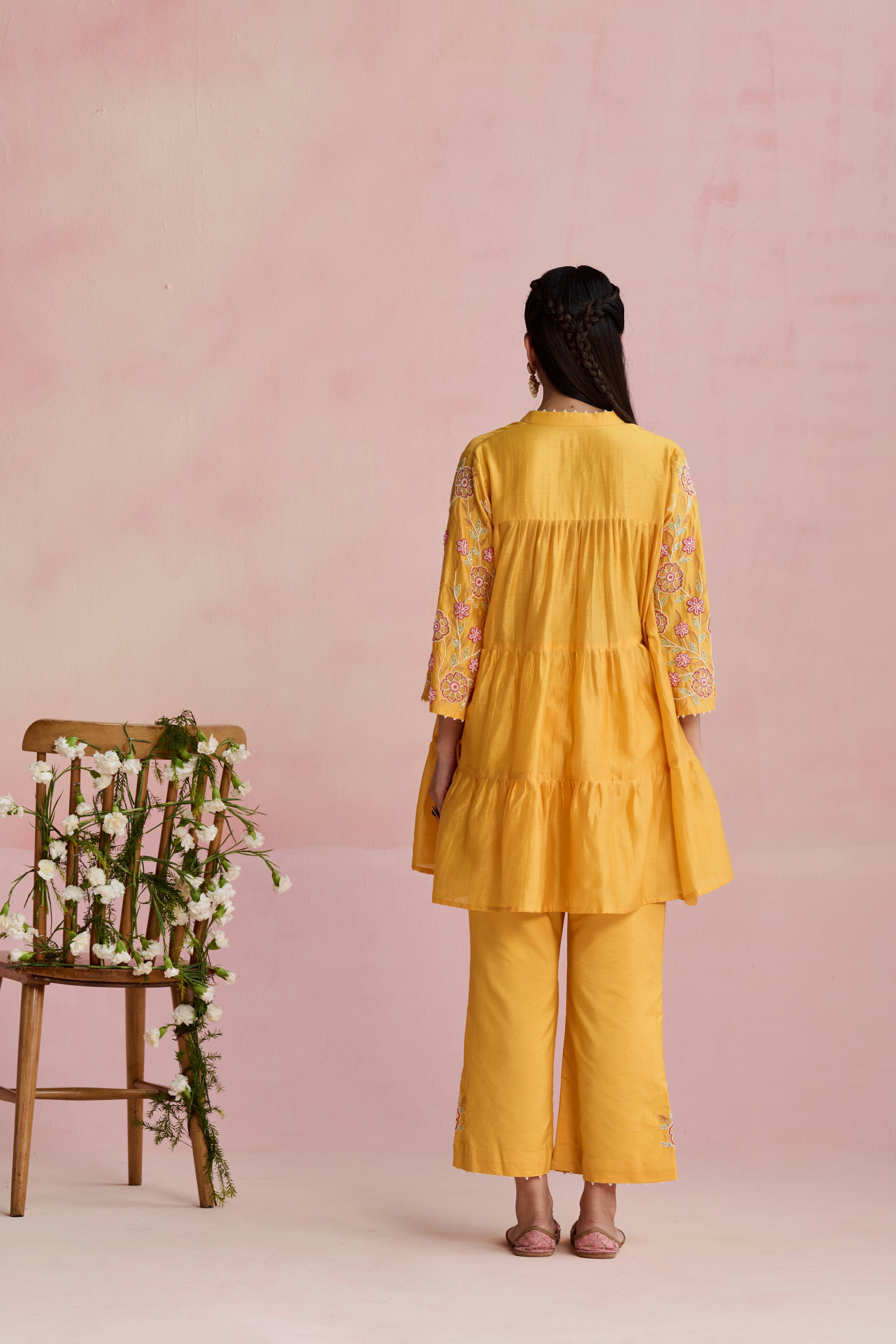 A model showcasing Niti Yellow Kurta Set by Nirvair from Nirvair's collection