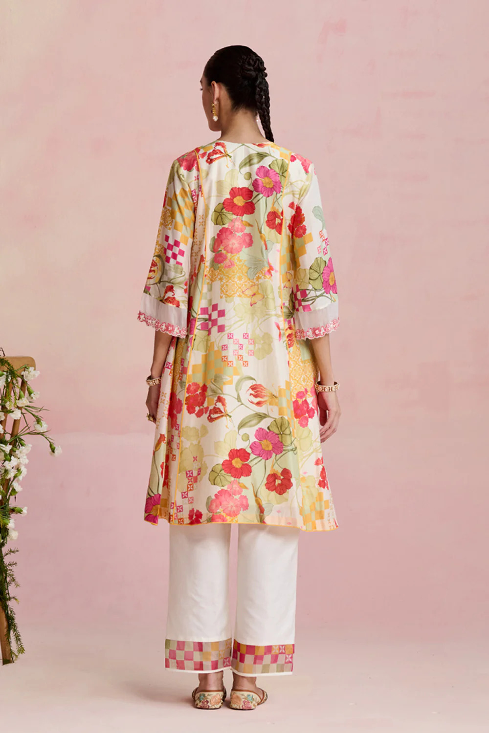 A model showcasing Nirvi Silk Kurta Suit by Nirvair from Nirvair's collection