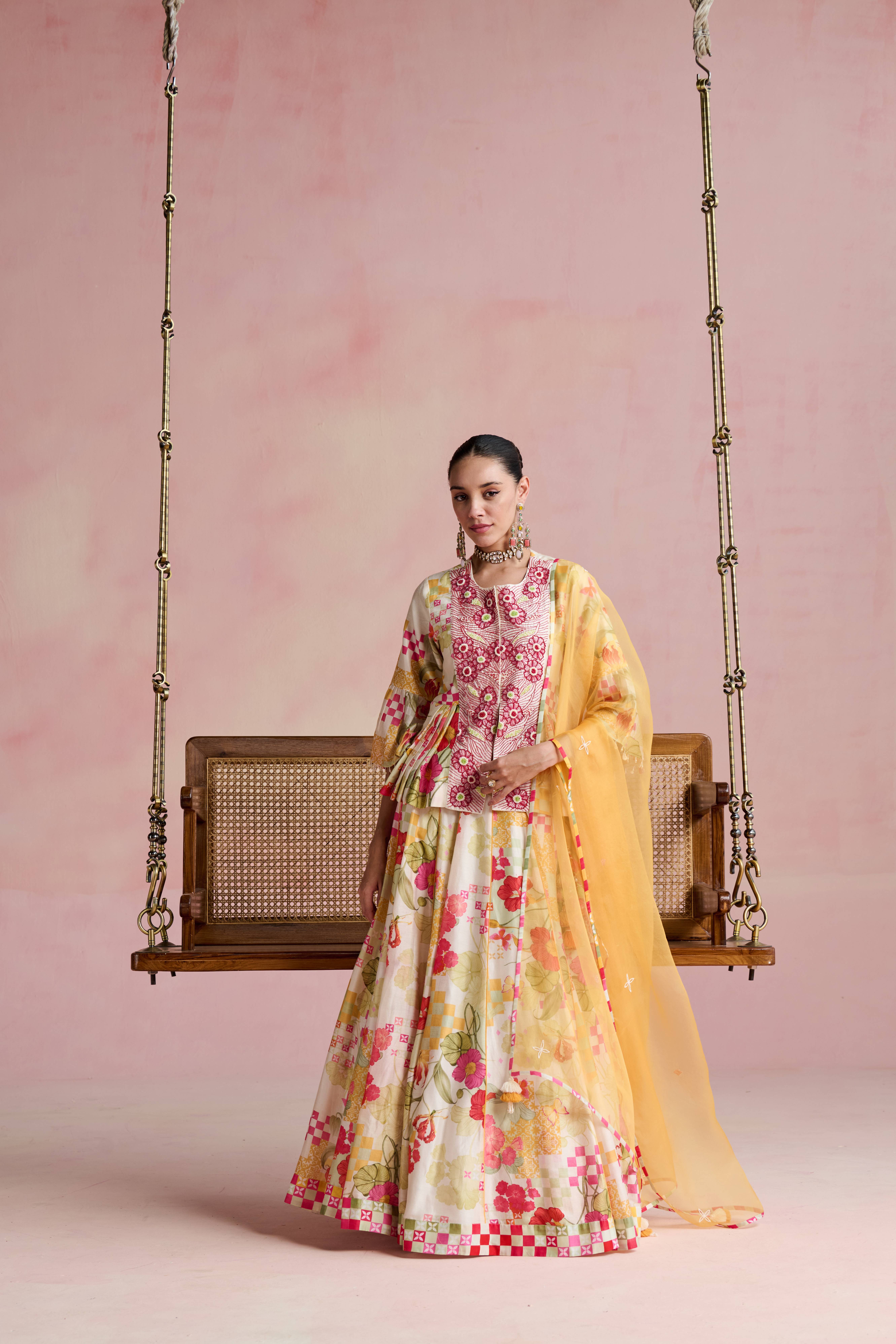A model showcasing Aswi Lehenga Set by Nirvair from Nirvair's collection