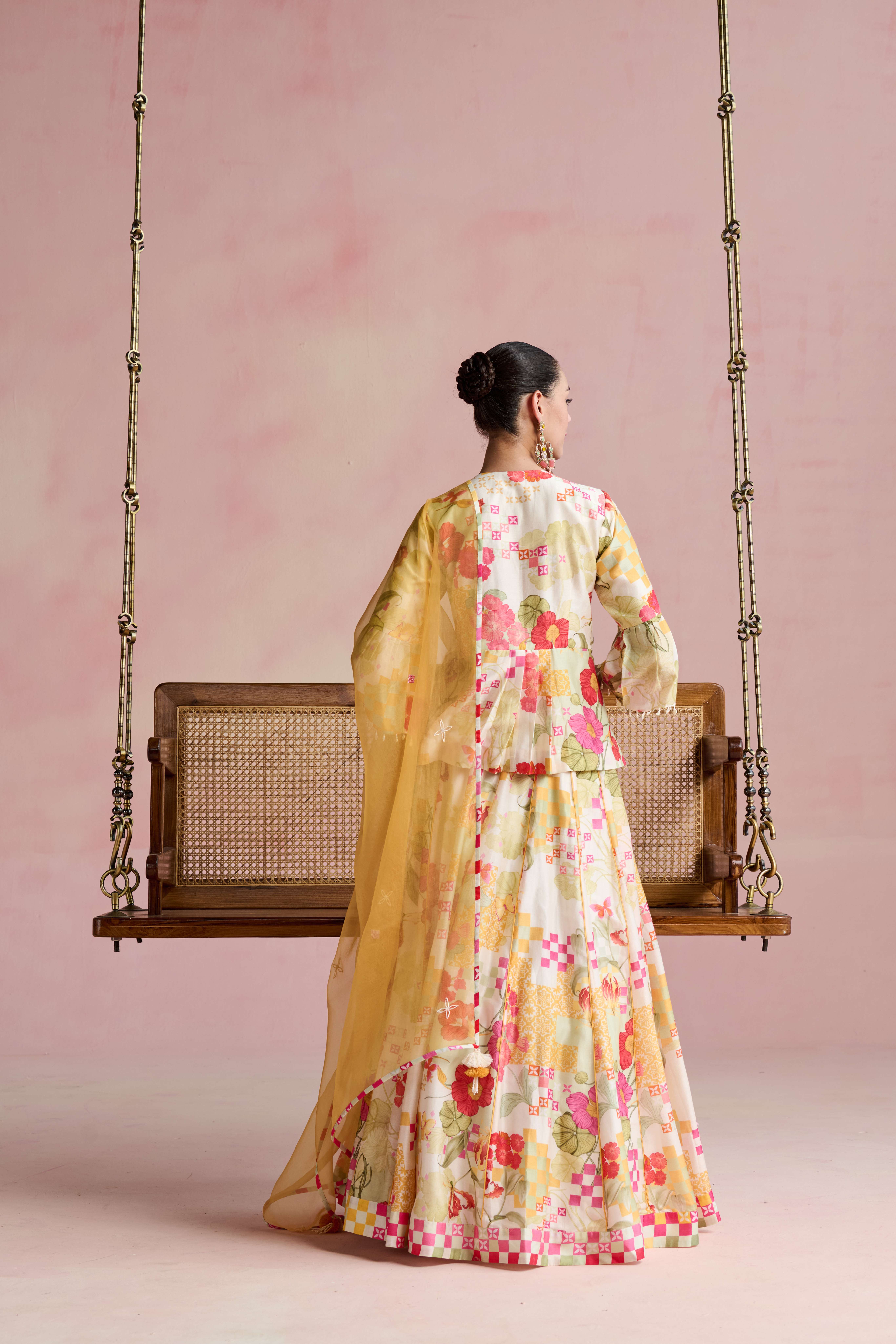 A model showcasing Aswi Lehenga Set by Nirvair from Nirvair's collection