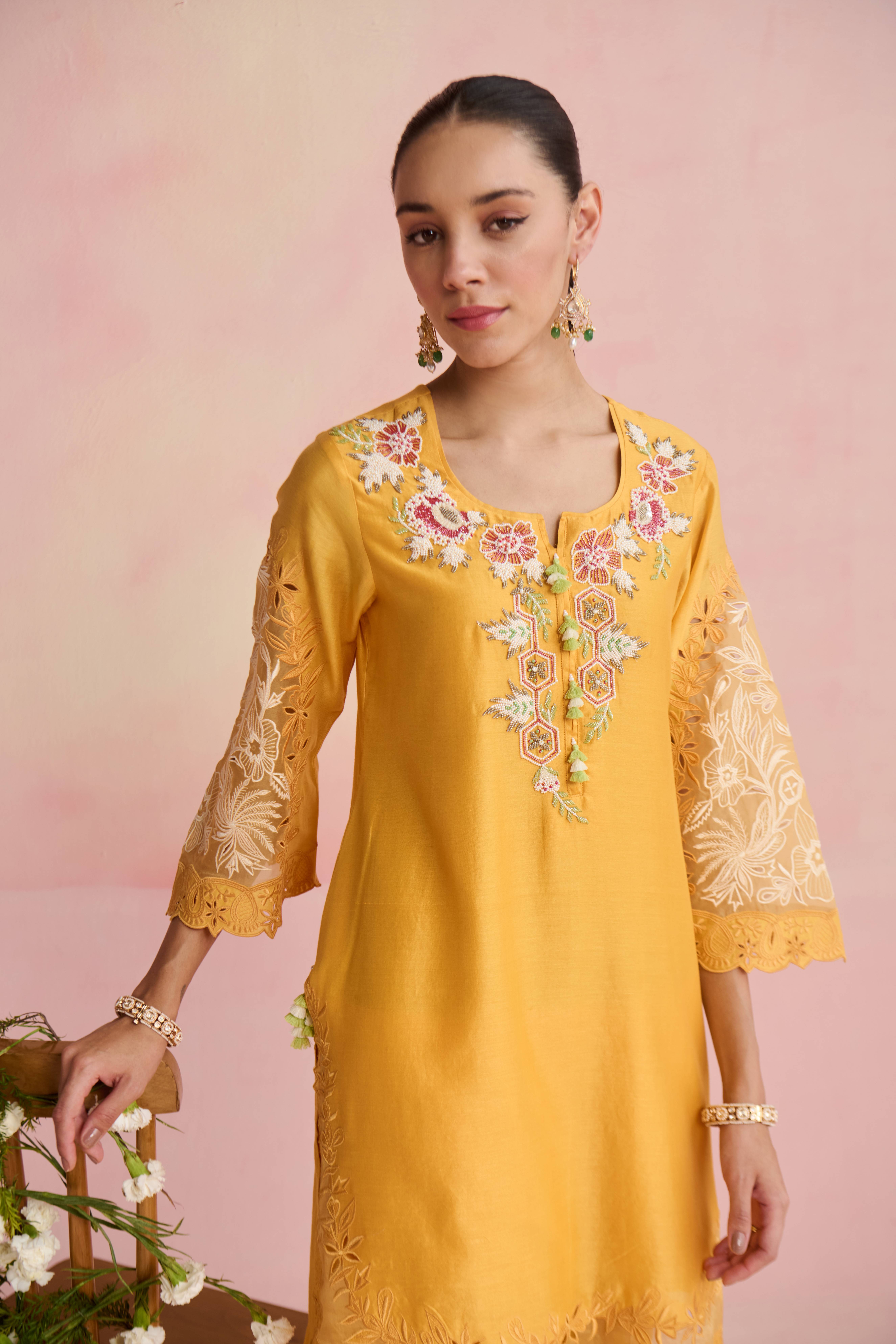 A model showcasing Ishana Yellow Kurta And Pants by Nirvair from Nirvair's collection