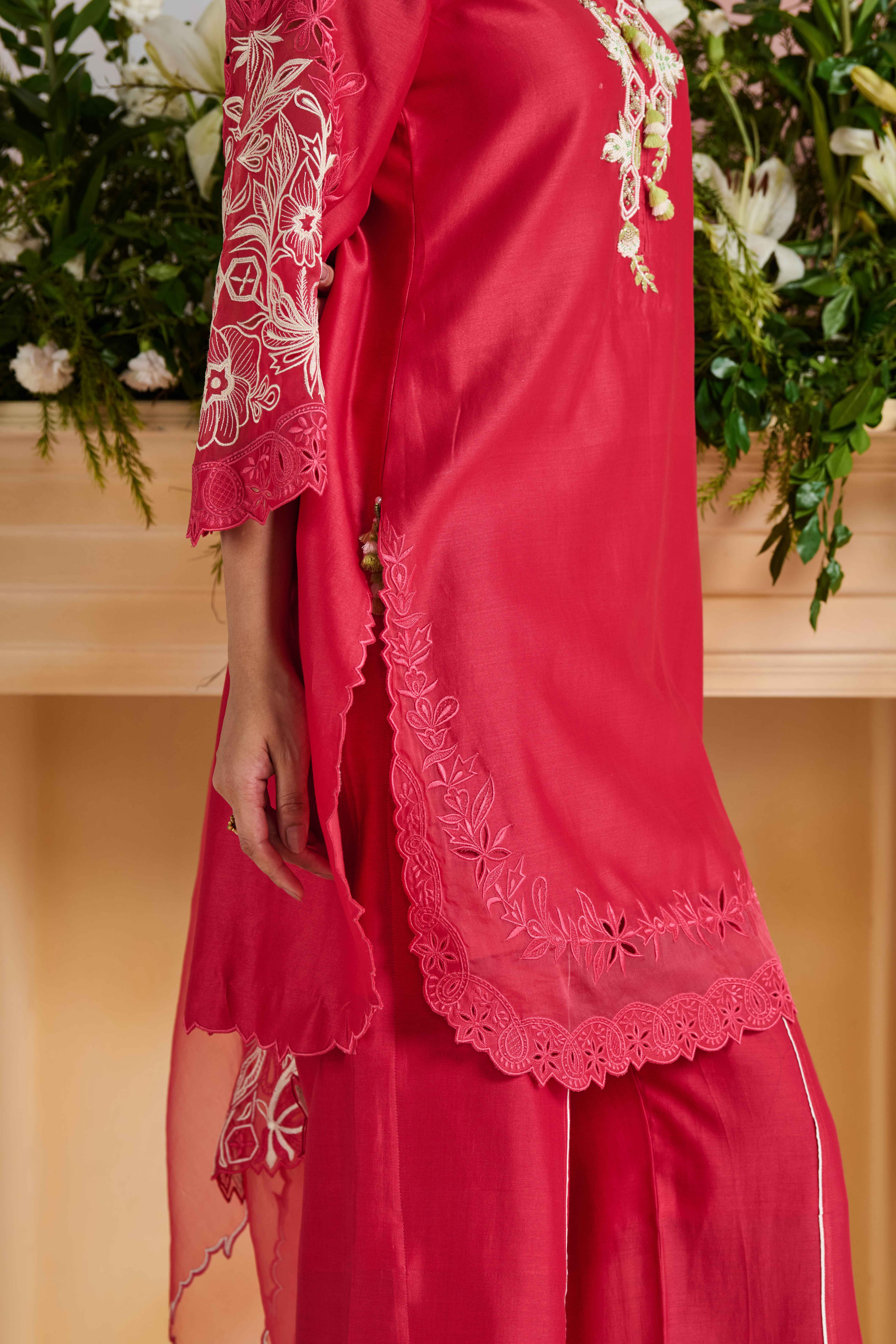 A model showcasing Ishana Bright Pink Kurta Suit by Nirvair from Nirvair's collection
