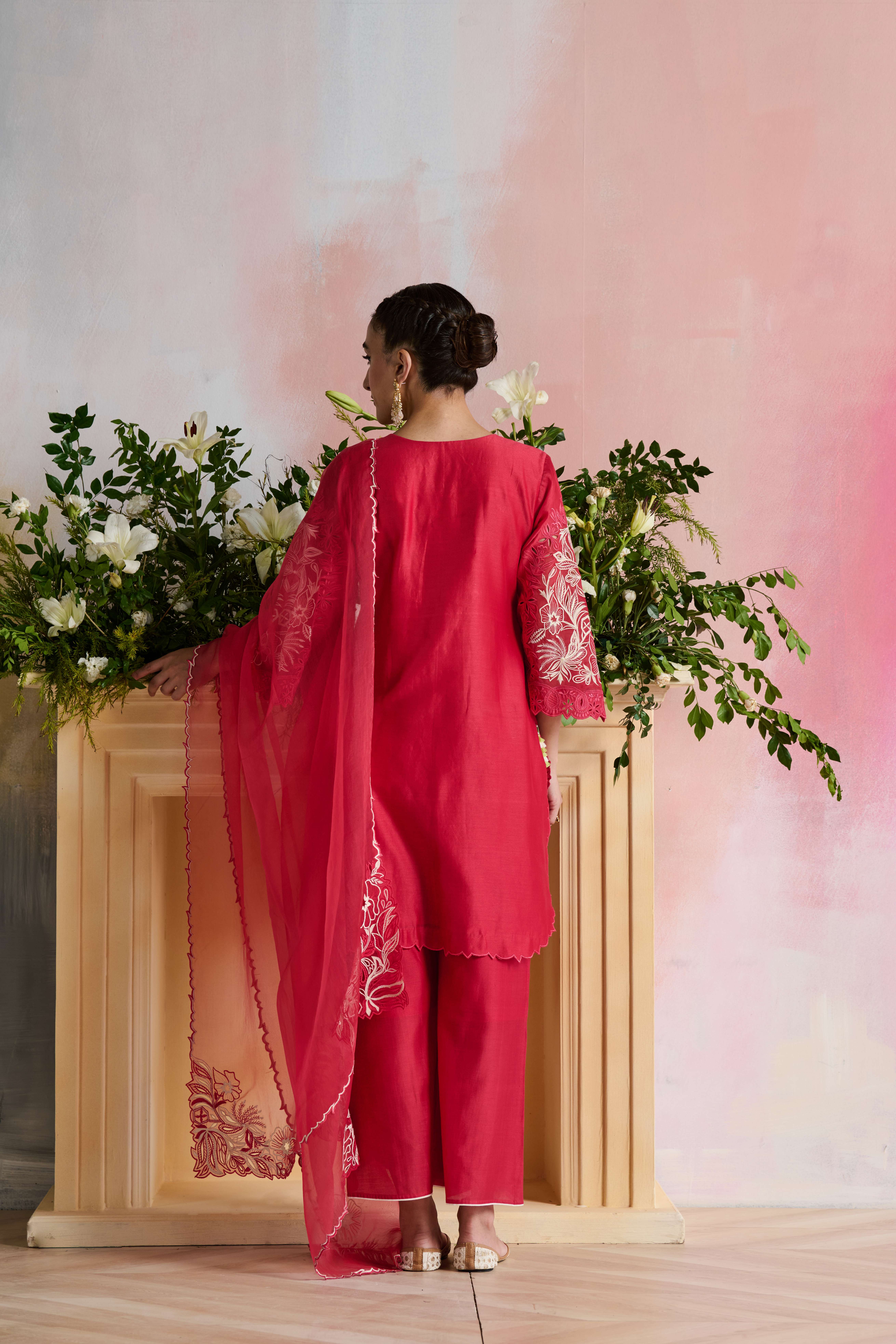 A model showcasing Ishana Bright Pink Kurta Suit by Nirvair from Nirvair's collection