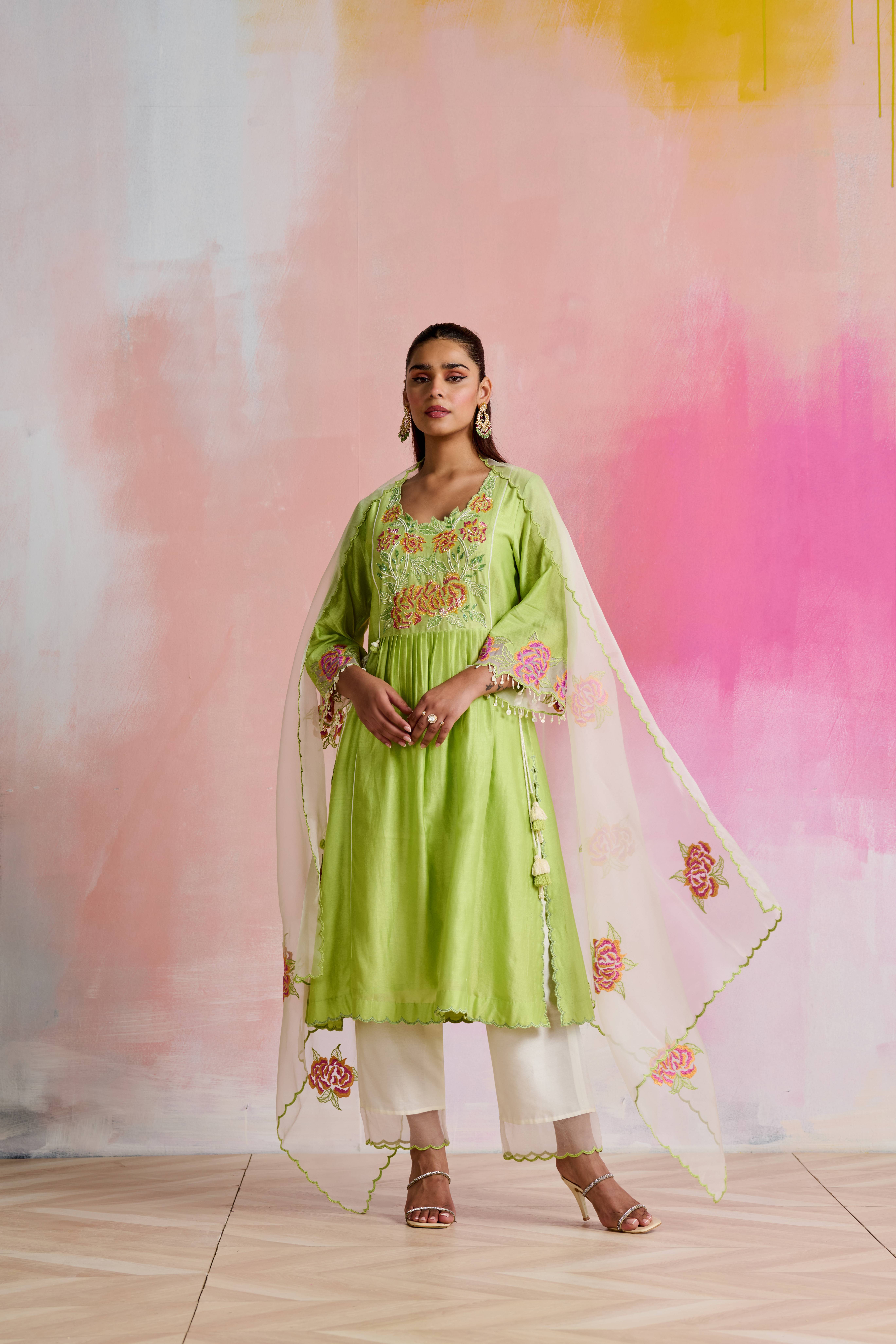 A model showcasing Atreyi Light Green Kurta With Bottom by Nirvair from Nirvair's collection
