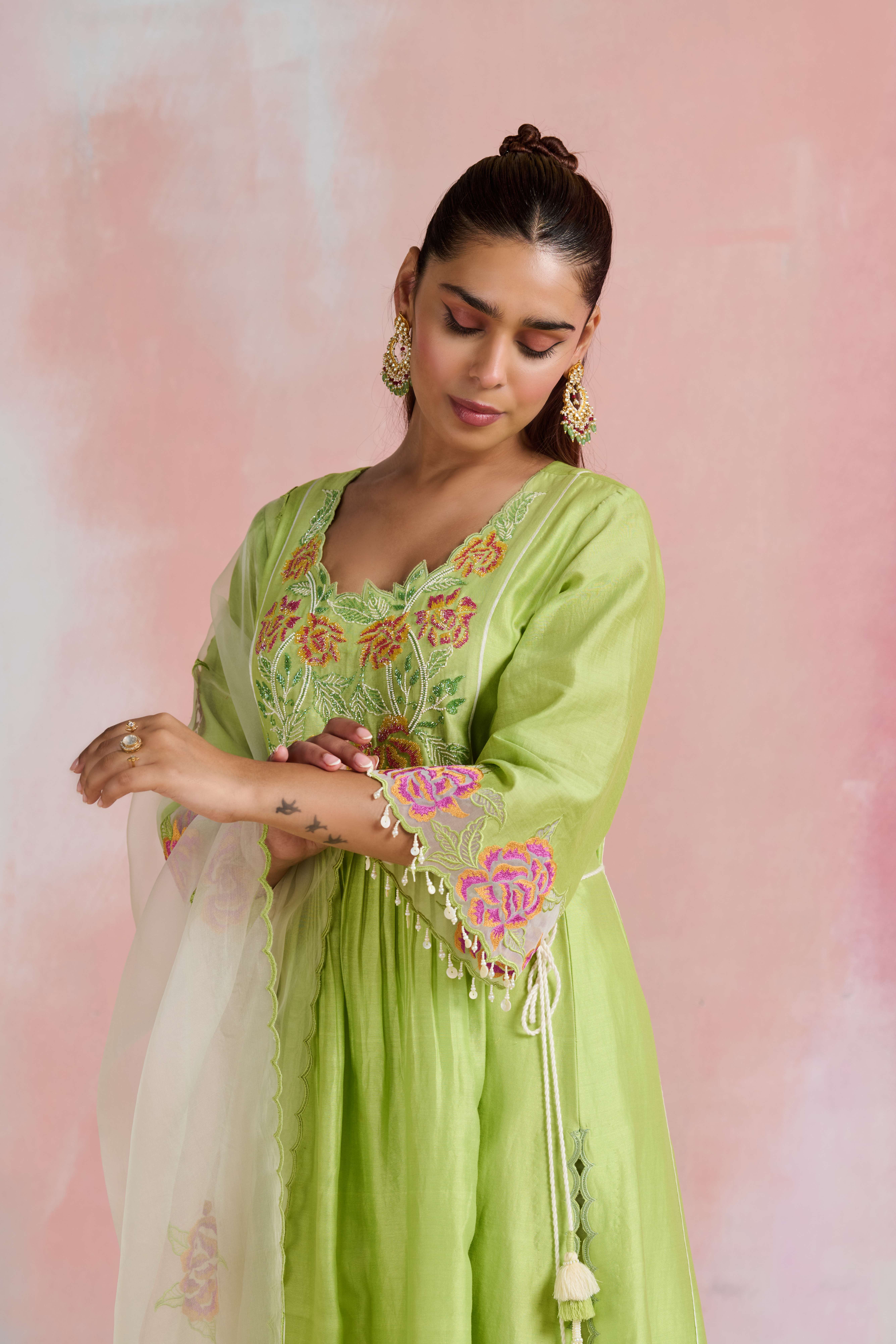 A model showcasing Atreyi Light Green Kurta With Bottom by Nirvair from Nirvair's collection