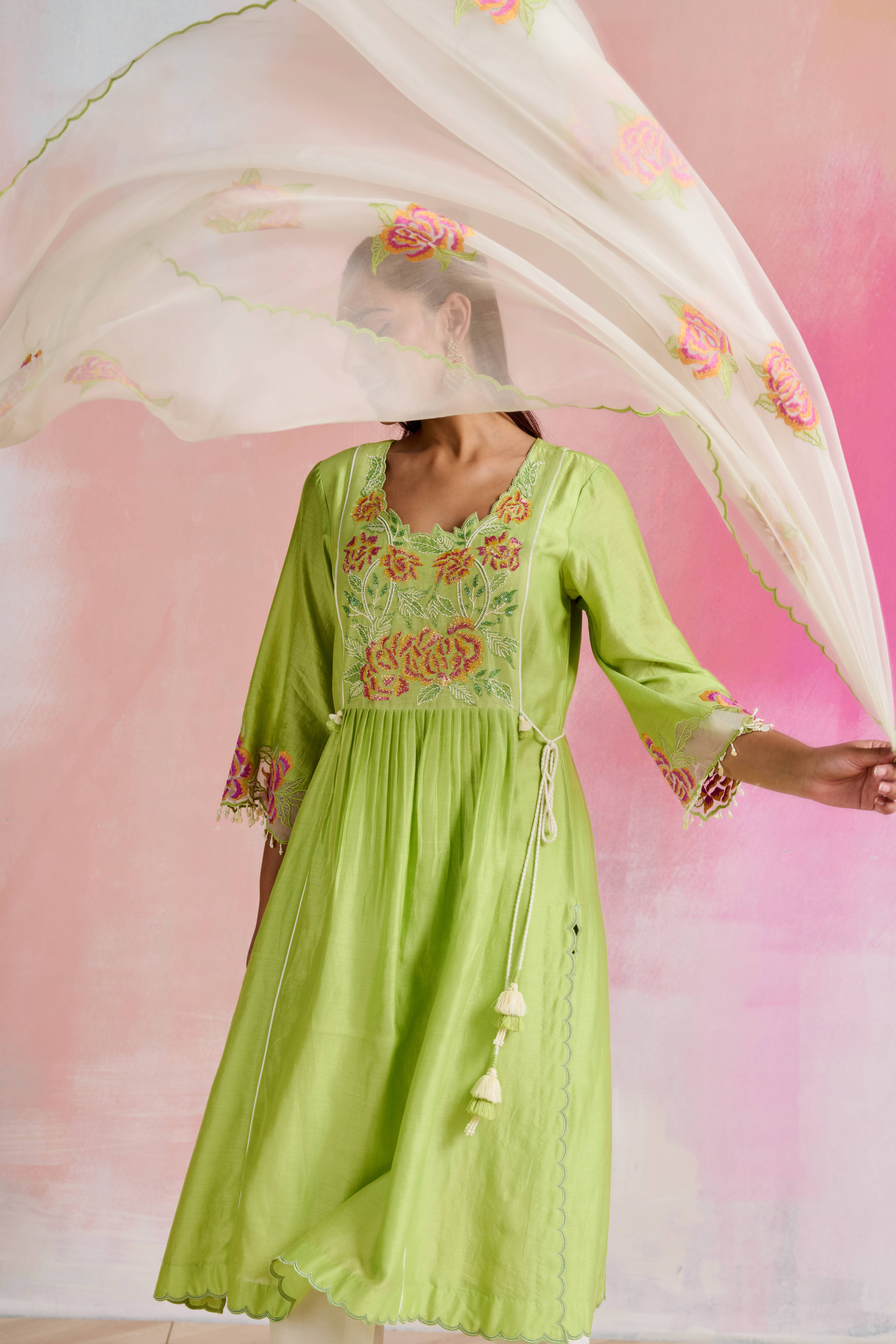 A model showcasing Atreyi Light Green Kurta With Bottom by Nirvair from Nirvair's collection
