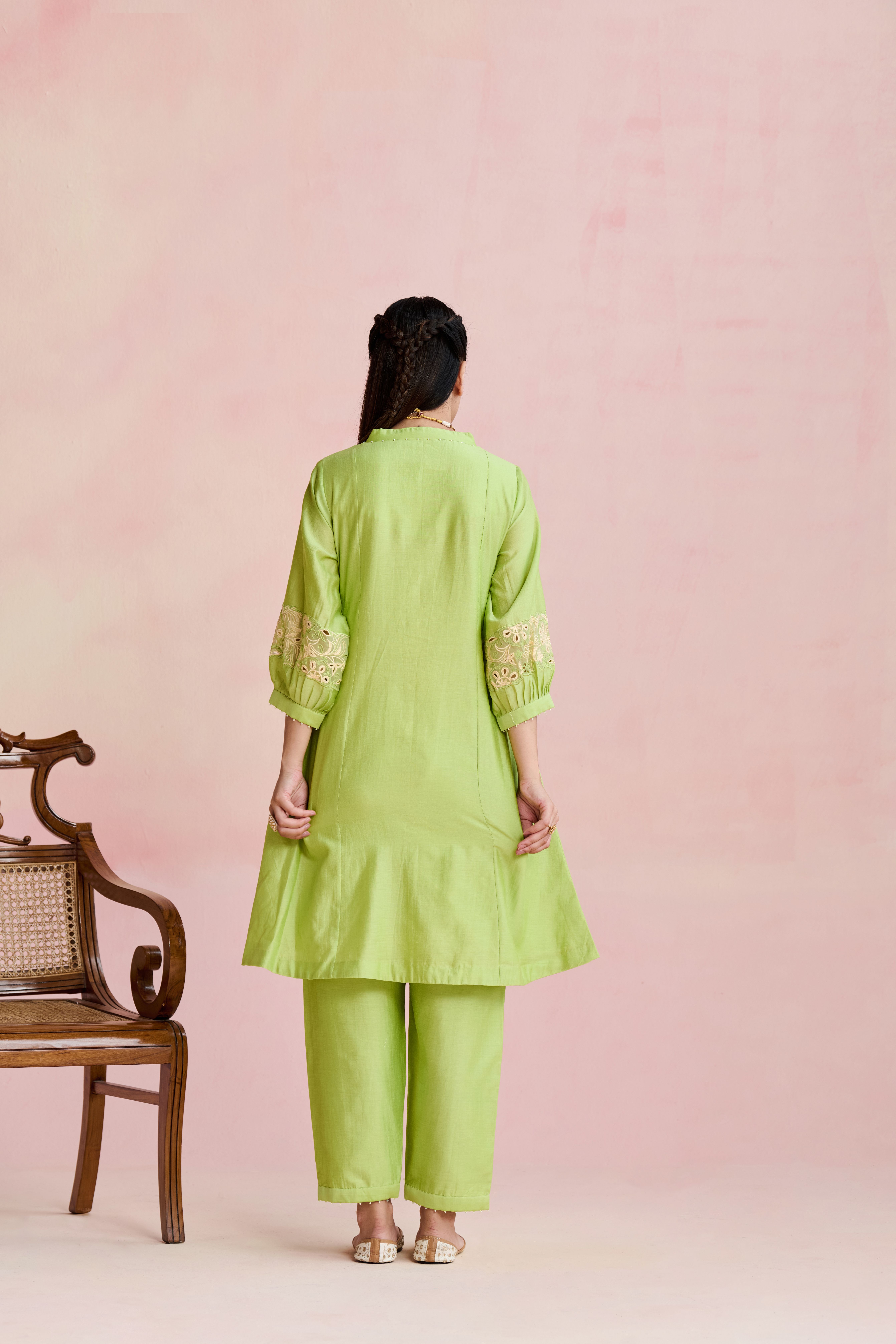 A model showcasing Neila Light Green Long Kurta Suit by Nirvair from Nirvair's collection