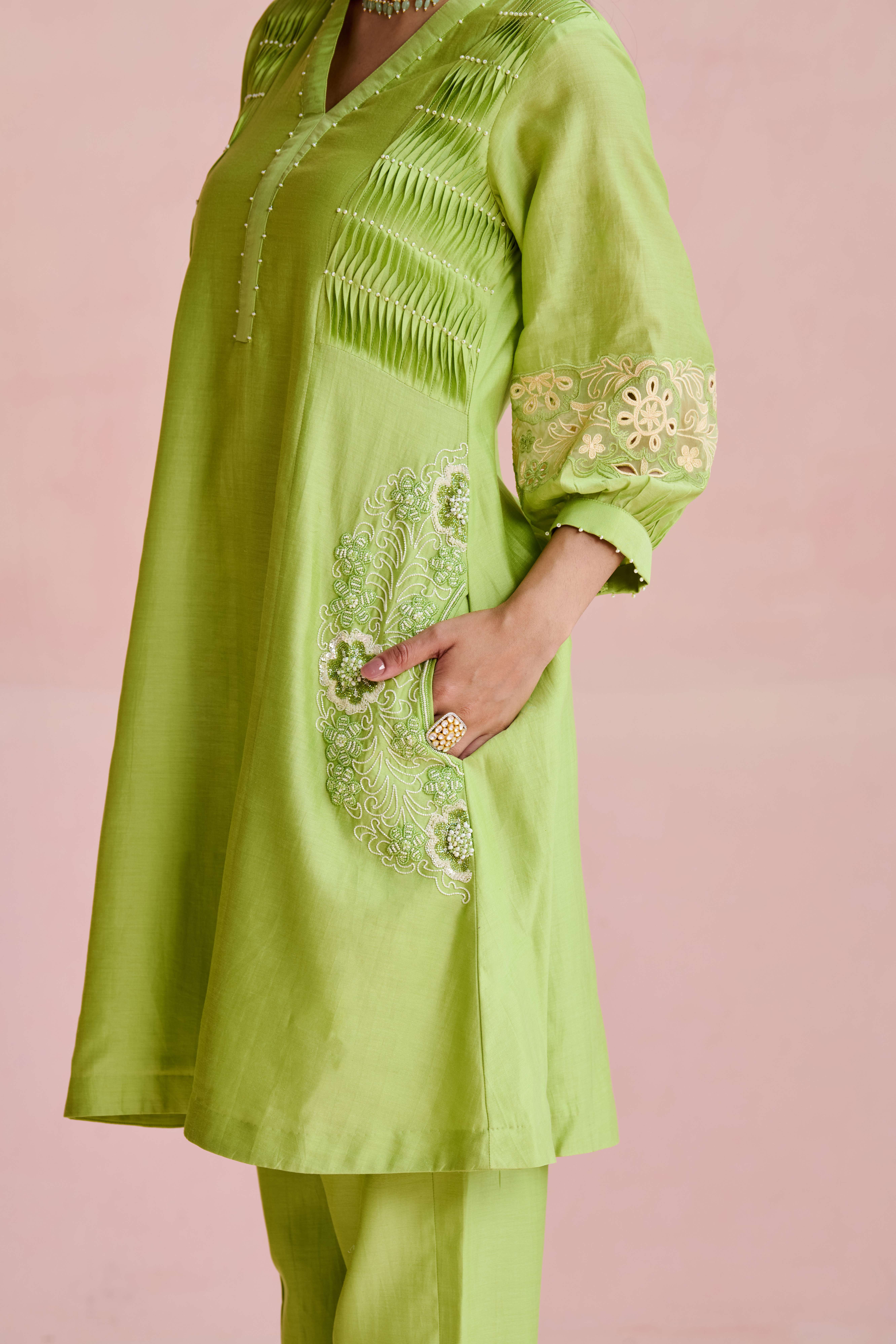 A model showcasing Neila Light Green Long Kurta Suit by Nirvair from Nirvair's collection