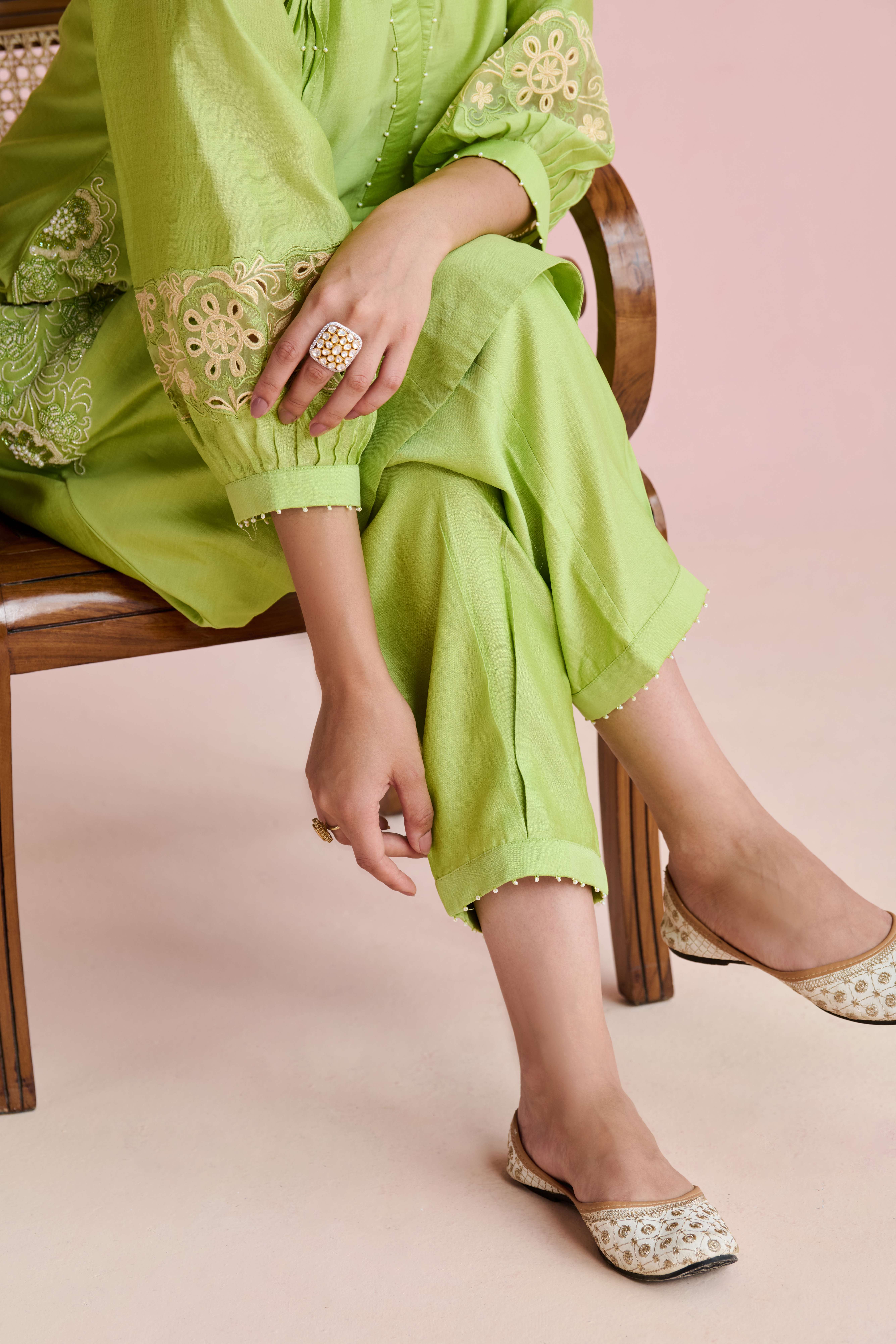 A model showcasing Neila Light Green Long Kurta Suit by Nirvair from Nirvair's collection