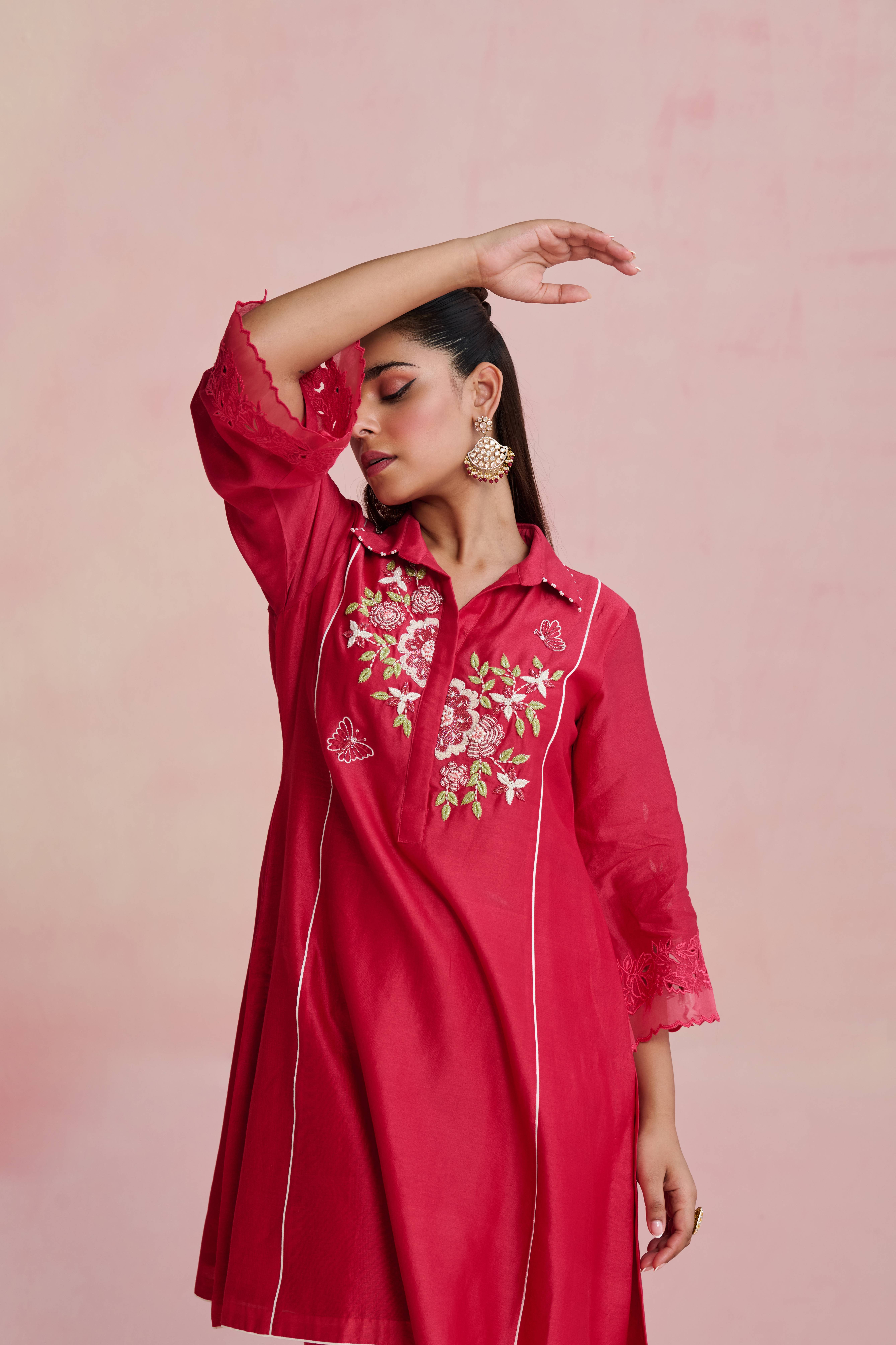 A model showcasing Vaani Raspberry Pink Kurta Set by Nirvair from Nirvair's collection