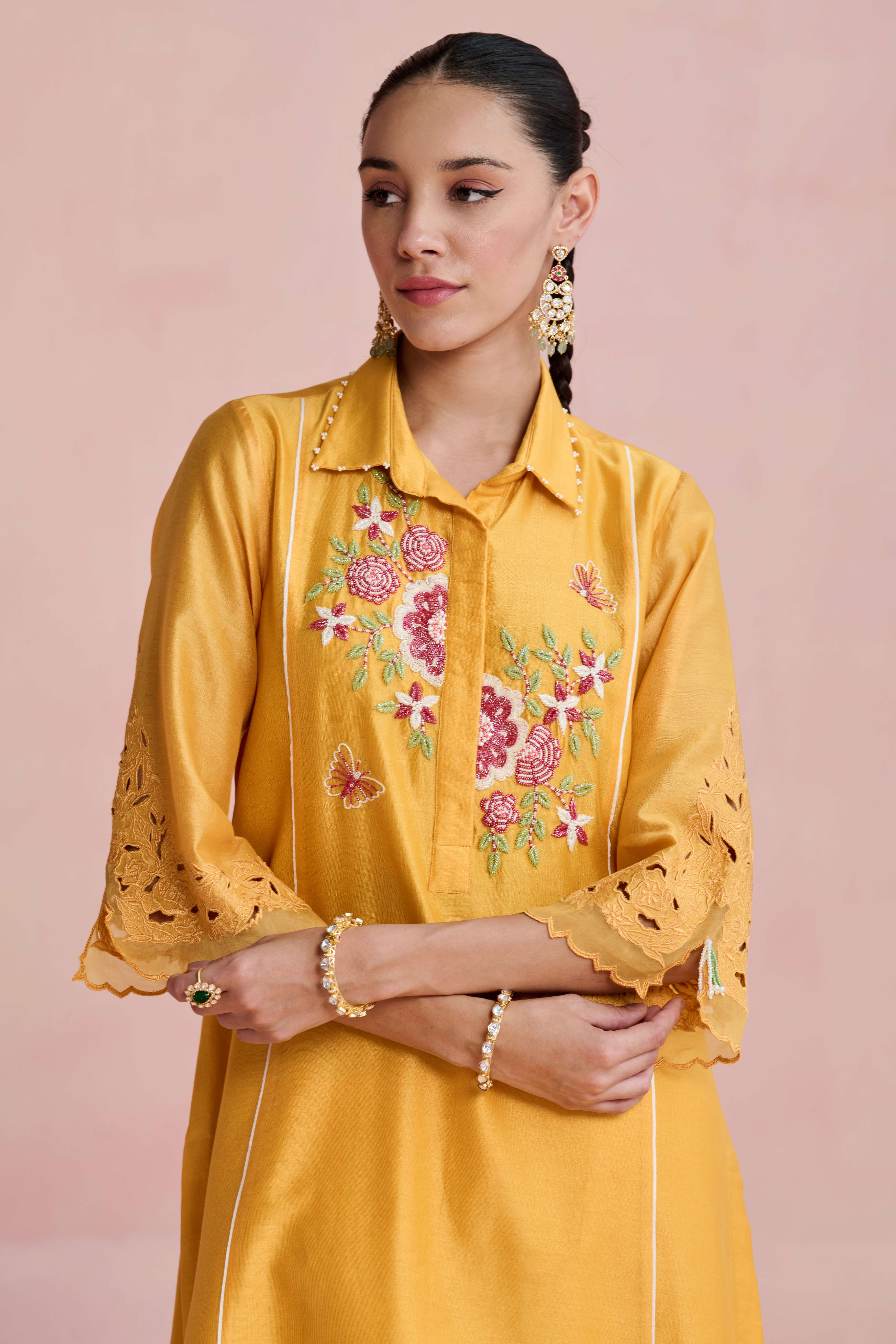 A model showcasing Vaani Yellow Kurta And Trouser by Nirvair from Nirvair's collection
