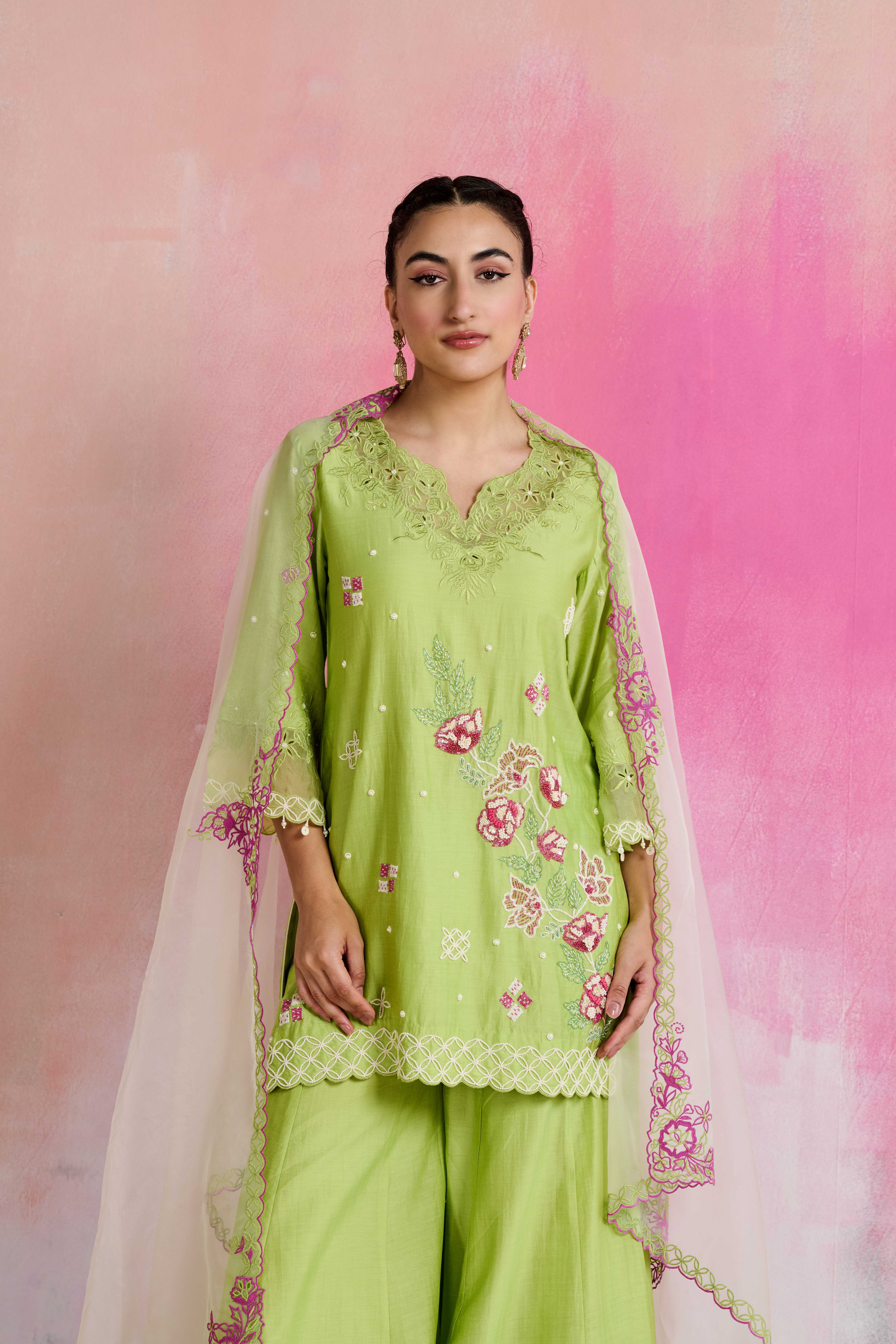 A model showcasing Zaida Light Green Kurta With Palazzo by Nirvair from Nirvair's collection