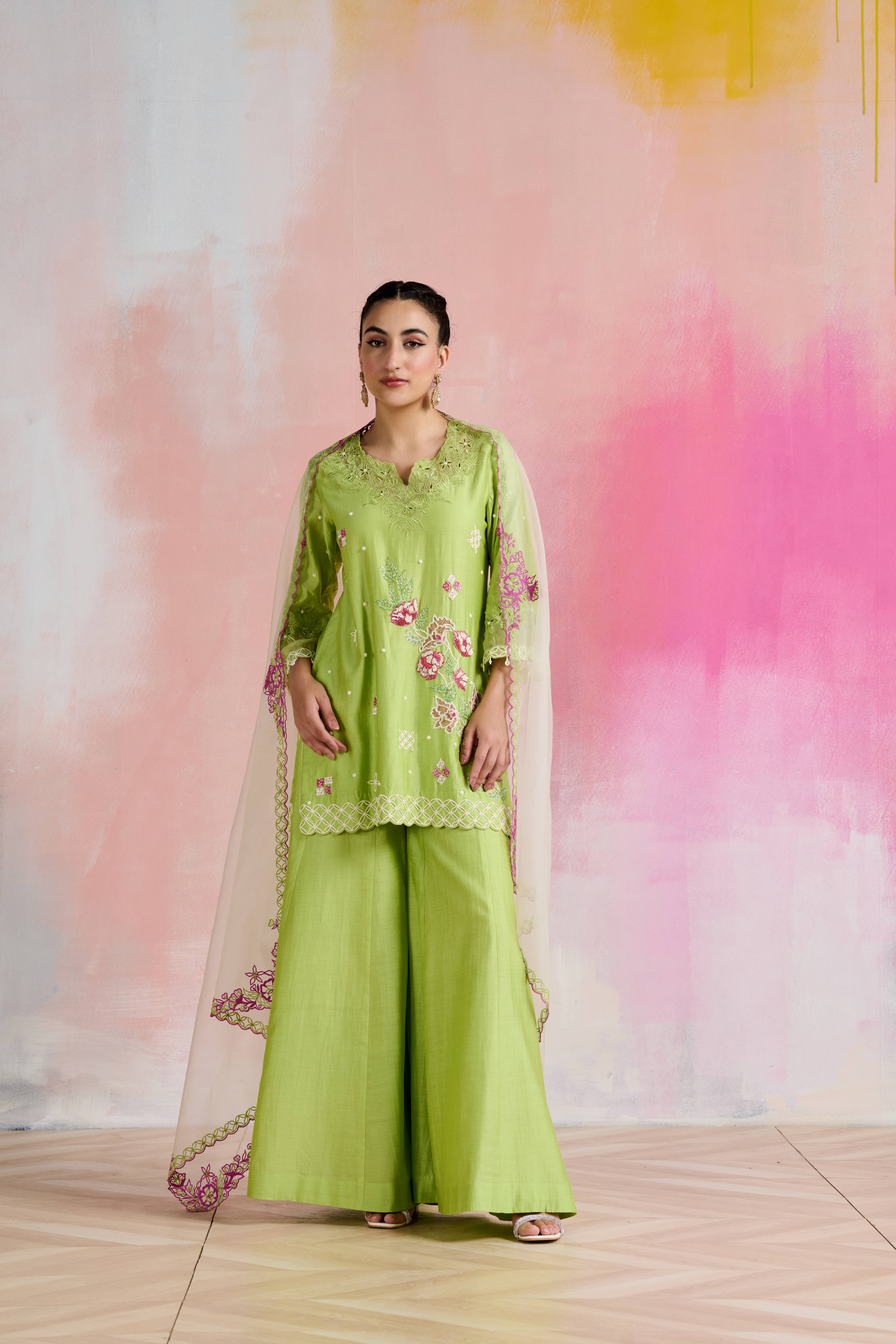 A model showcasing Zaida Light Green Kurta With Palazzo by Nirvair from Nirvair's collection