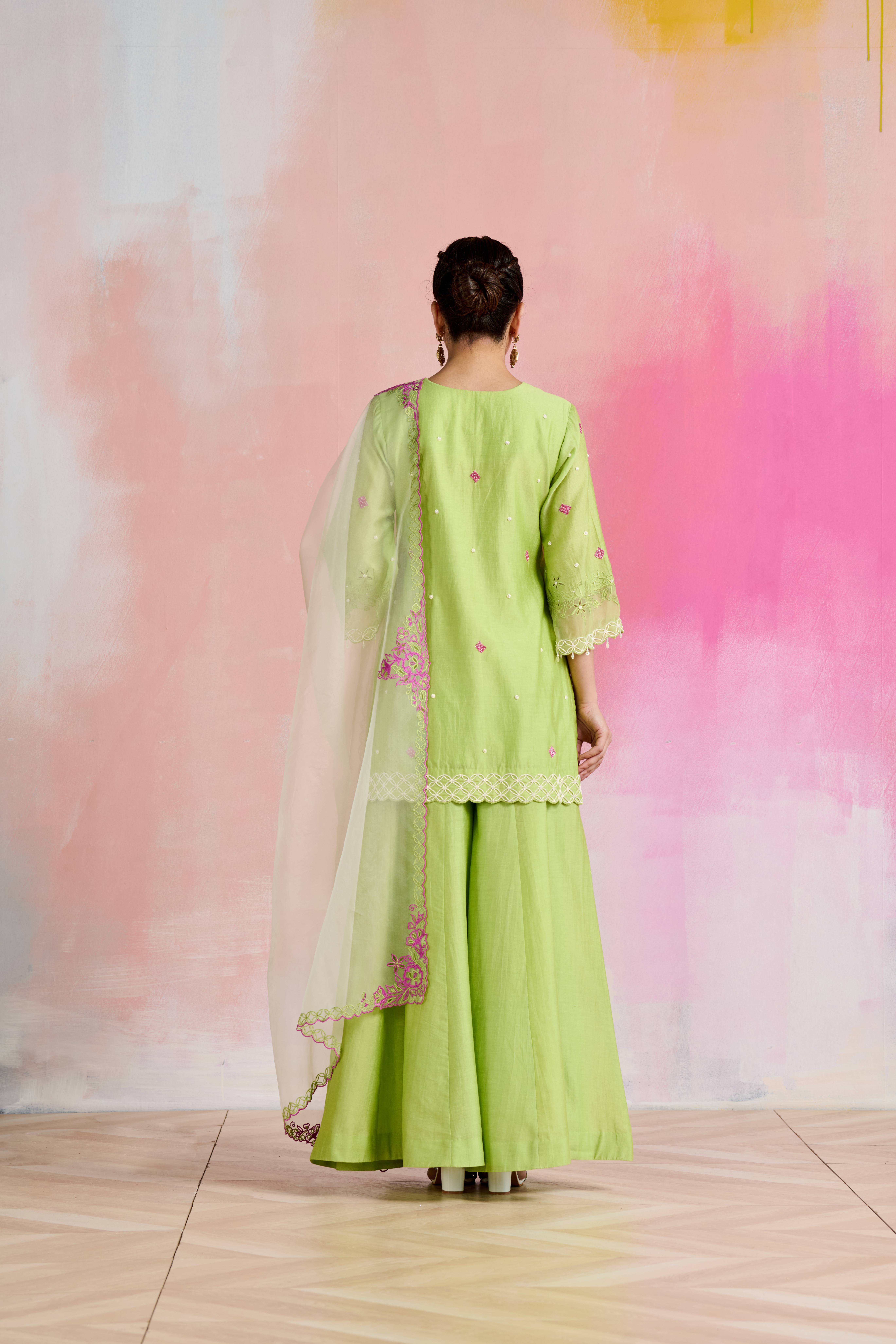 A model showcasing Zaida Light Green Kurta With Palazzo by Nirvair from Nirvair's collection