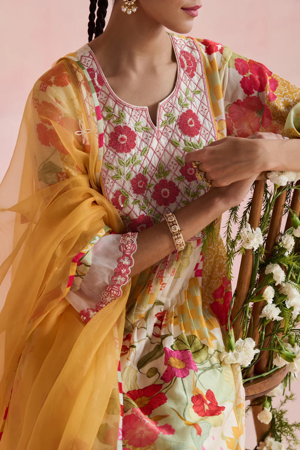 A model showcasing Nirvi Yellow Pure Organza Dupatta by Nirvair from Nirvair's collection A model showcasing Nirvi Yellow Pure Organza Dupatta by Nirvair from Nirvair's collection