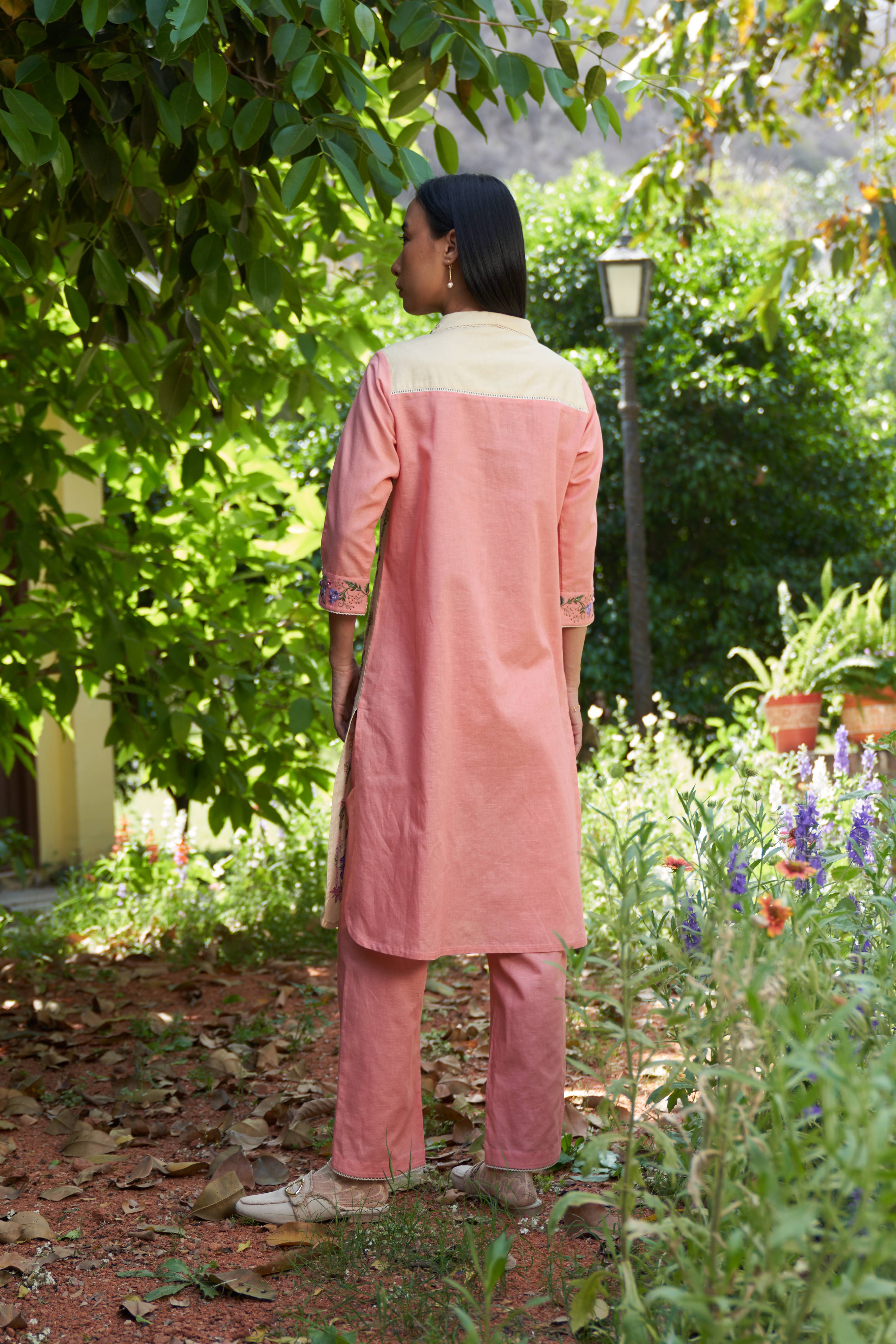 A model showcasing Tulip Rose Pink Kurta Set by Nirvair from Nirvair's collection