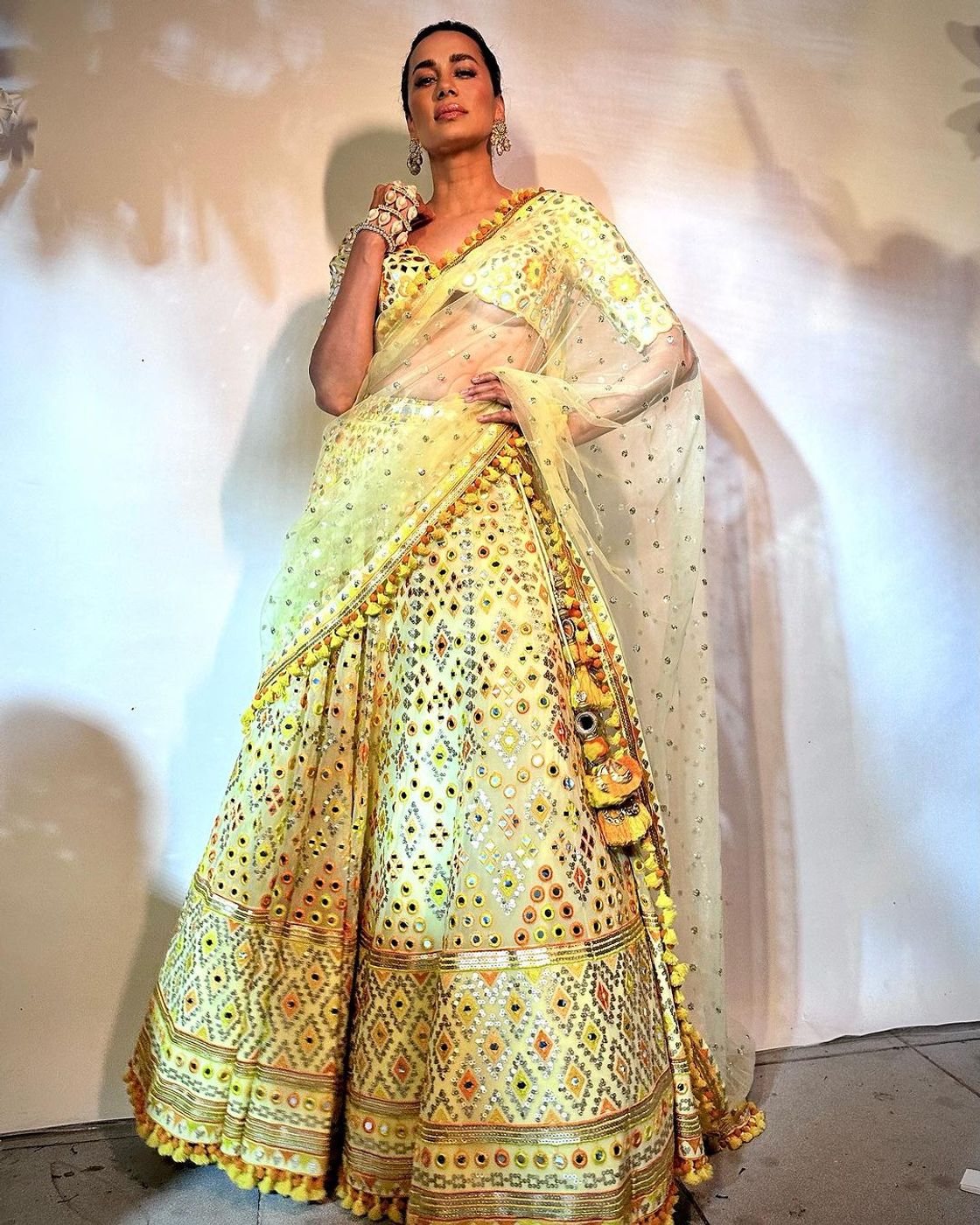 A model showcasing Yellow Anha Lehenga Set Feature image by Gopi Vaid from Gopi Vaid's collection