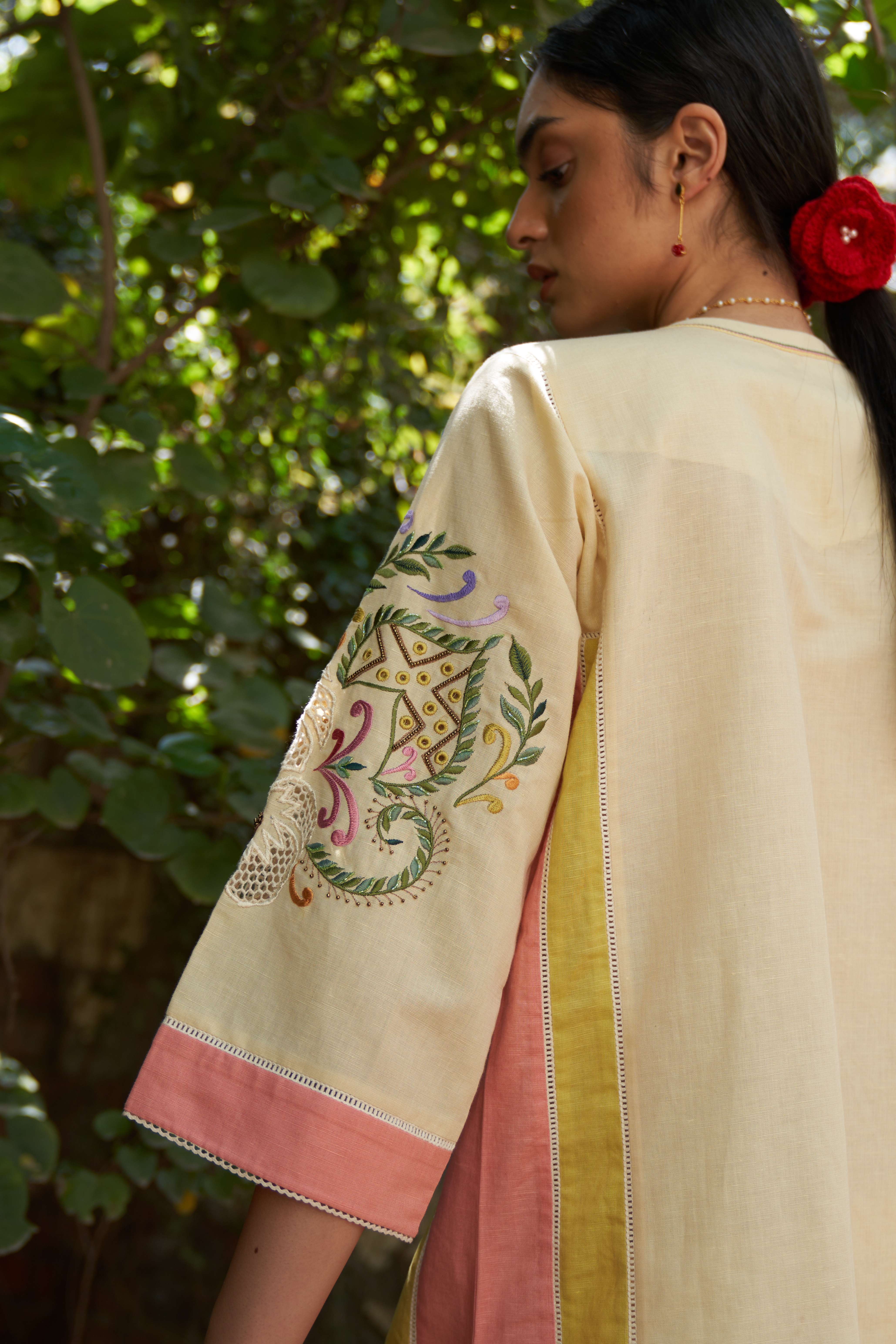 A model showcasing Zinnia Kurta With Salwar Set by Nirvair from Nirvair's collection