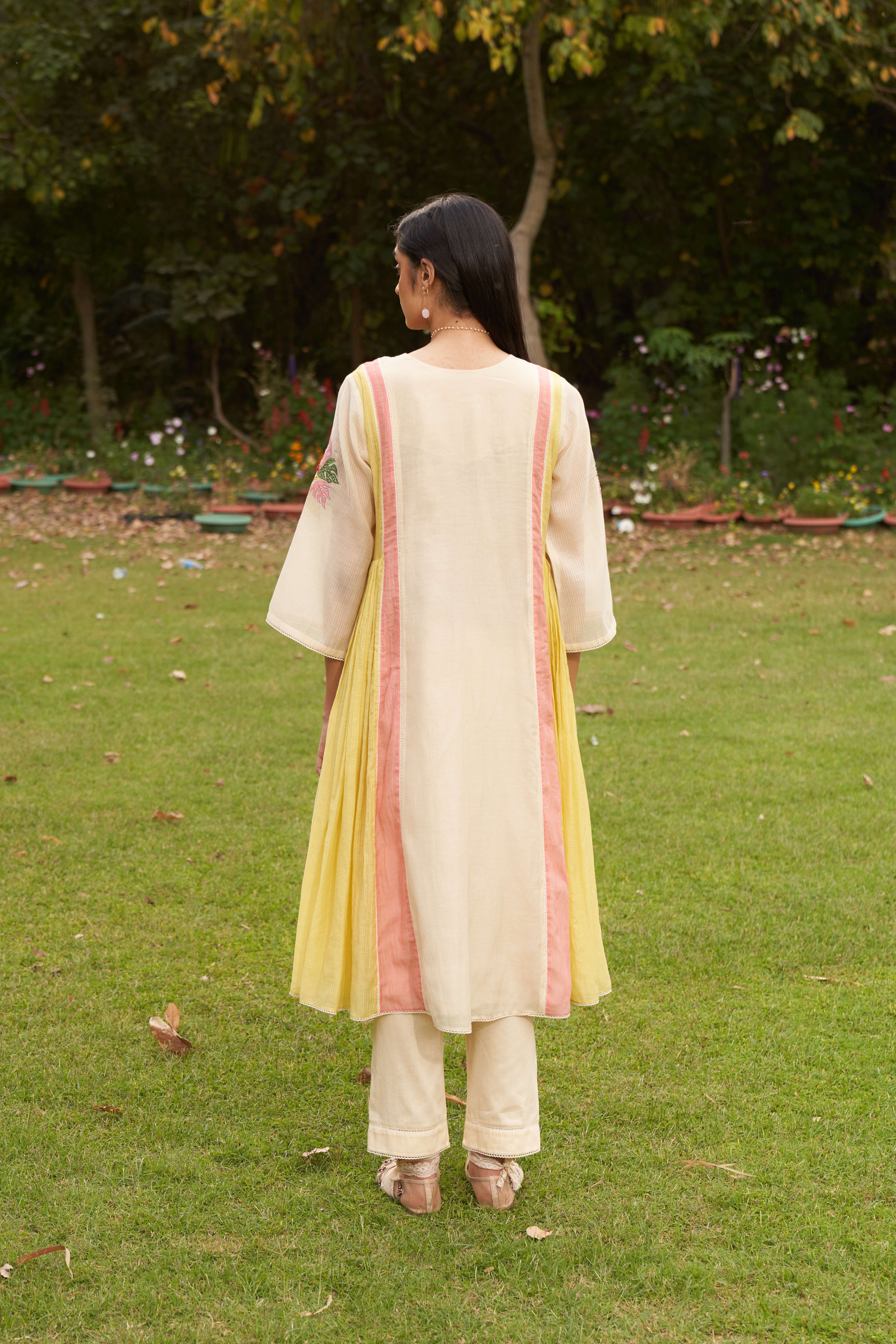 A model showcasing Forgetmenot Kurta Suit by Nirvair from Nirvair's collection