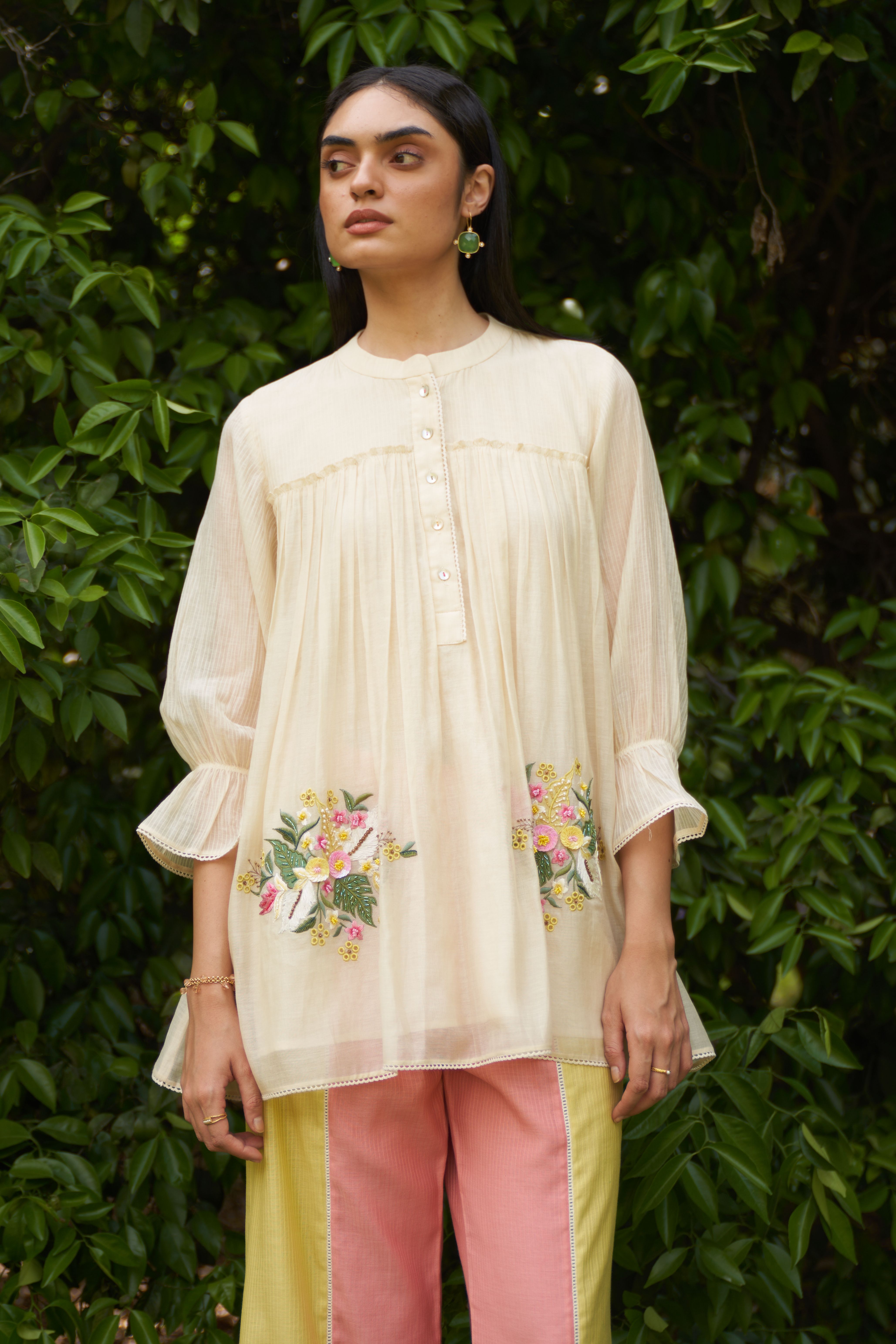A model showcasing Calla Cream Coord Set by Nirvair from Nirvair's collection