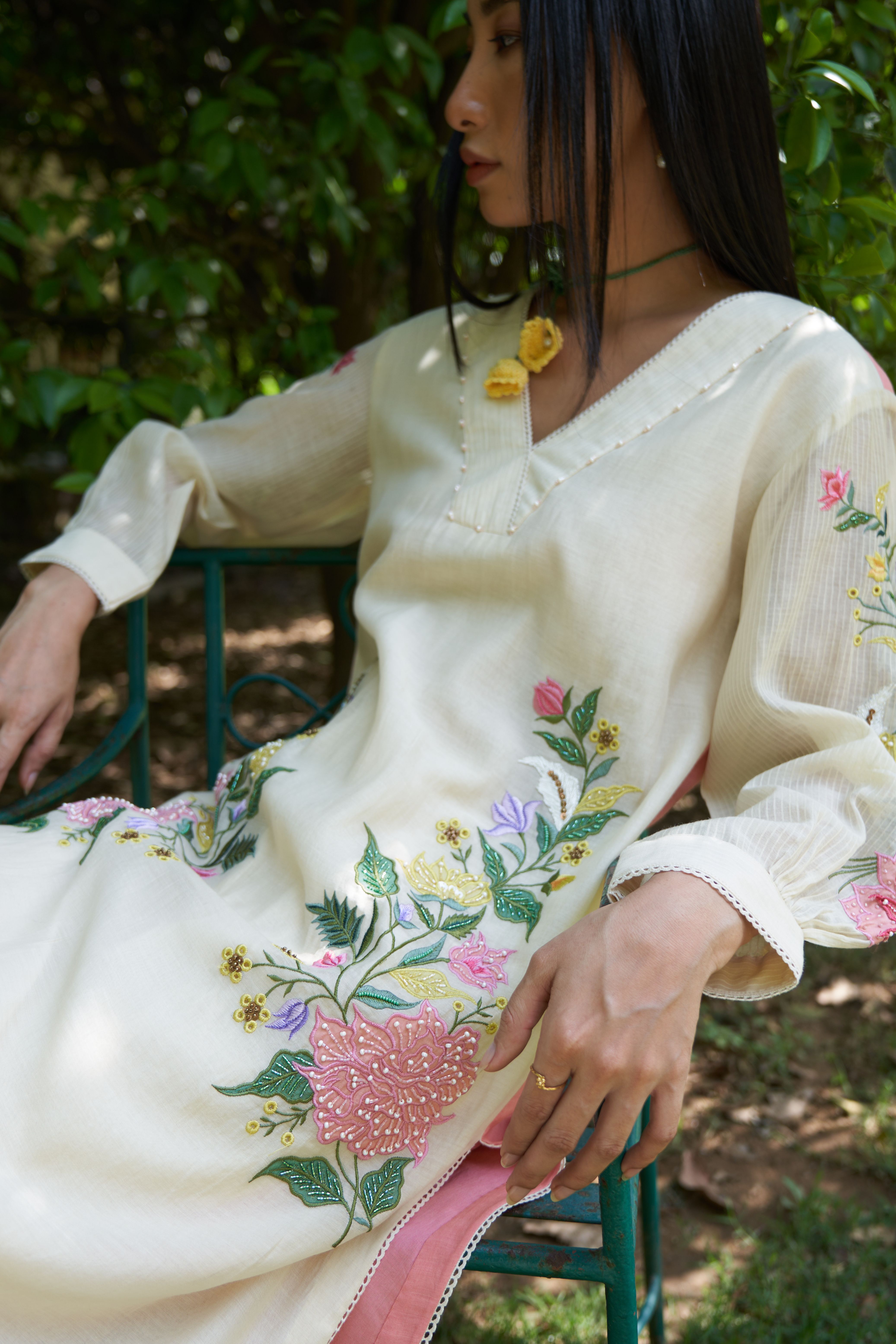 A model showcasing Blossom Kurta With Pants by Nirvair from Nirvair's collection