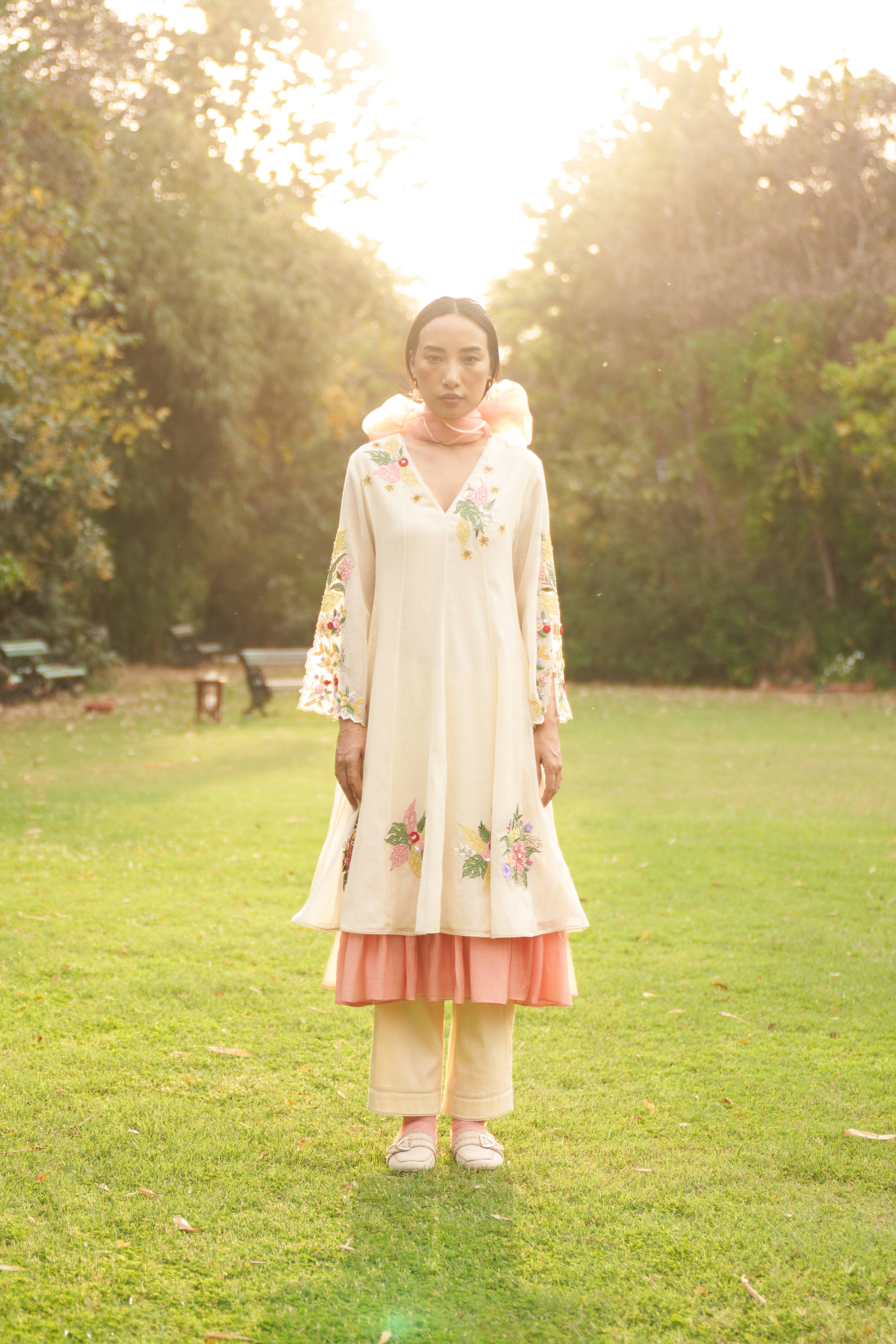 A model showcasing Sweet Pea Kurta Set by Nirvair from Nirvair's collection