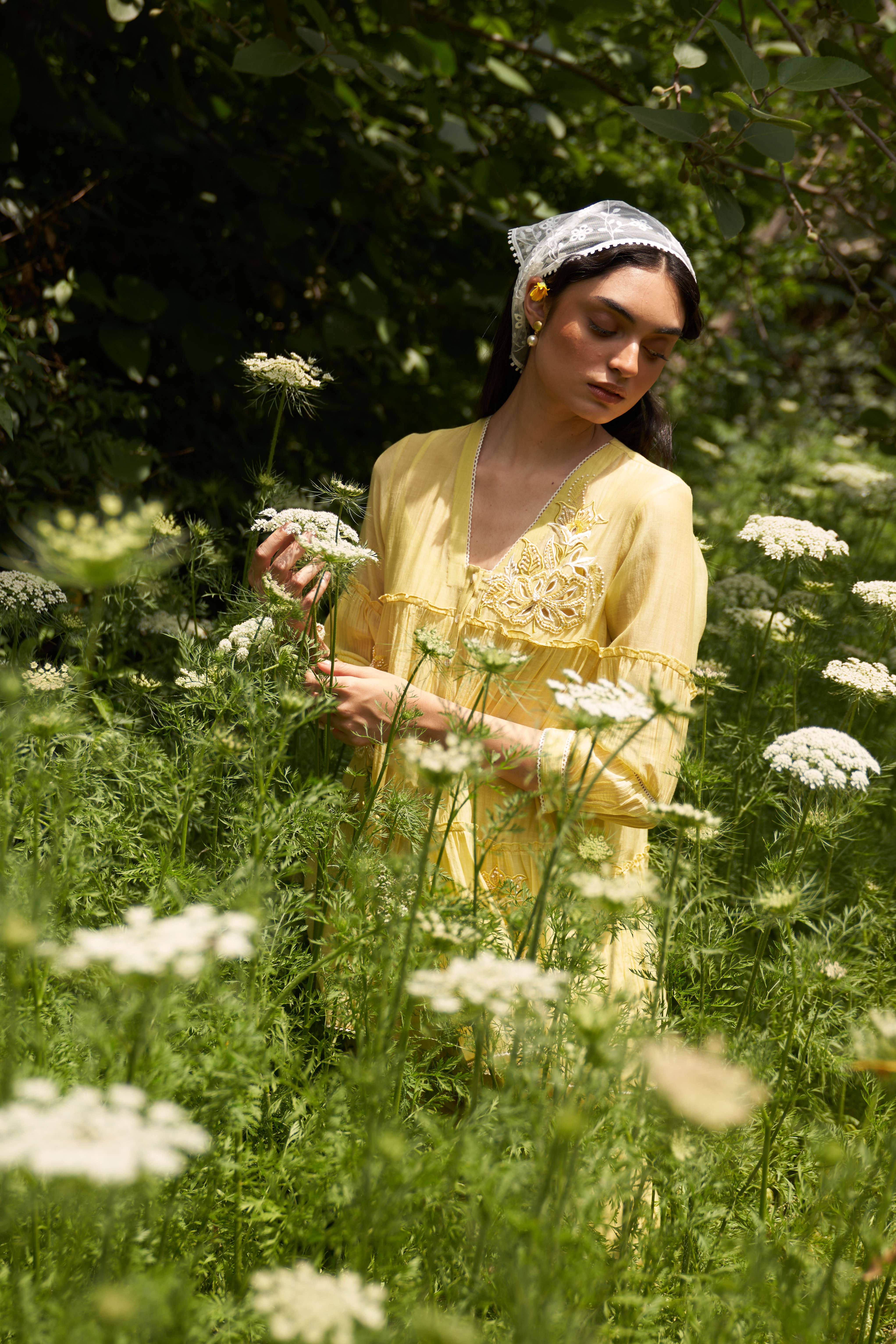A model showcasing Magnolia Lemon Zest Coord Set by Nirvair from Nirvair's collection