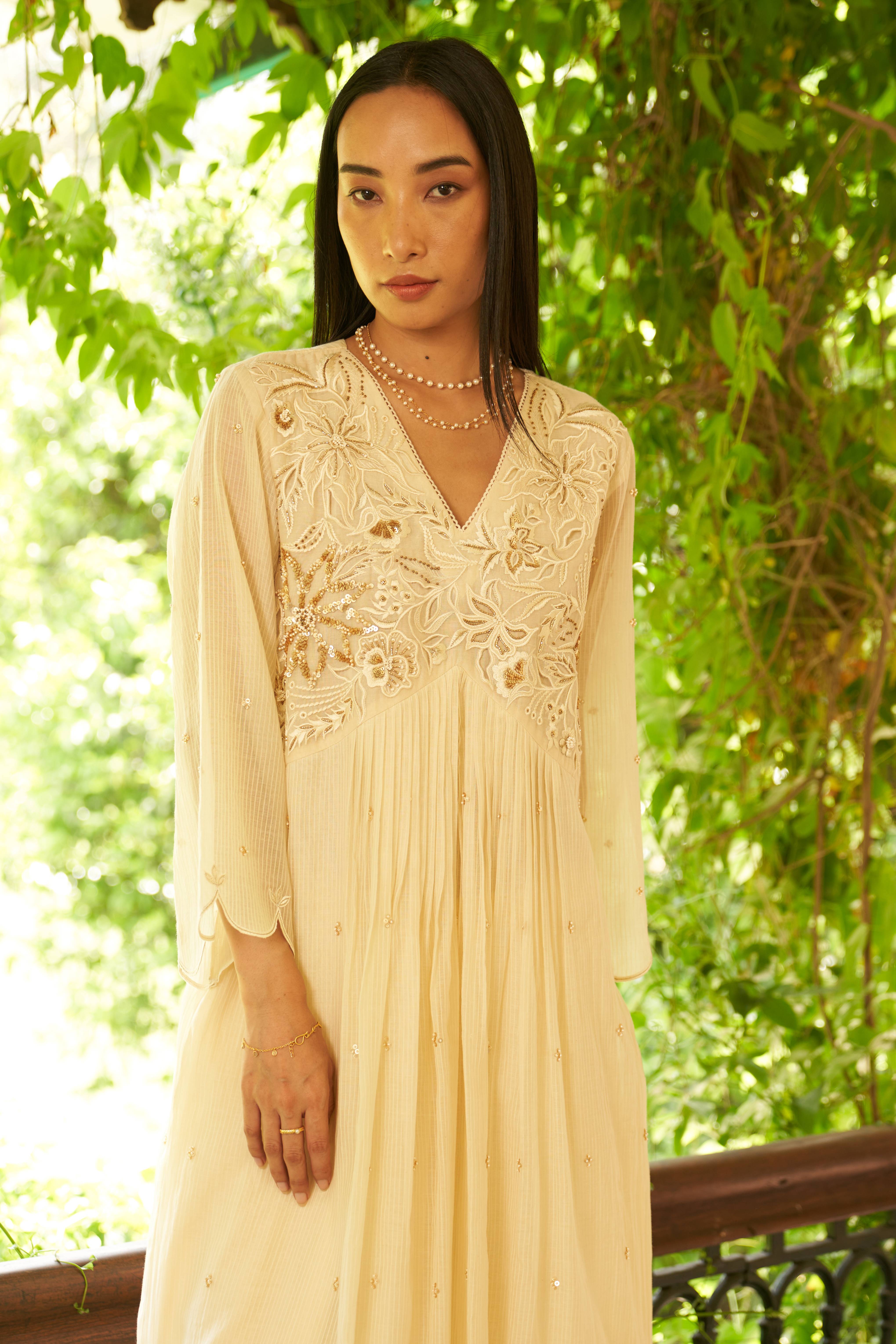 A model showcasing Bella Ivory Blush Kurta Suit by Nirvair from Nirvair's collection