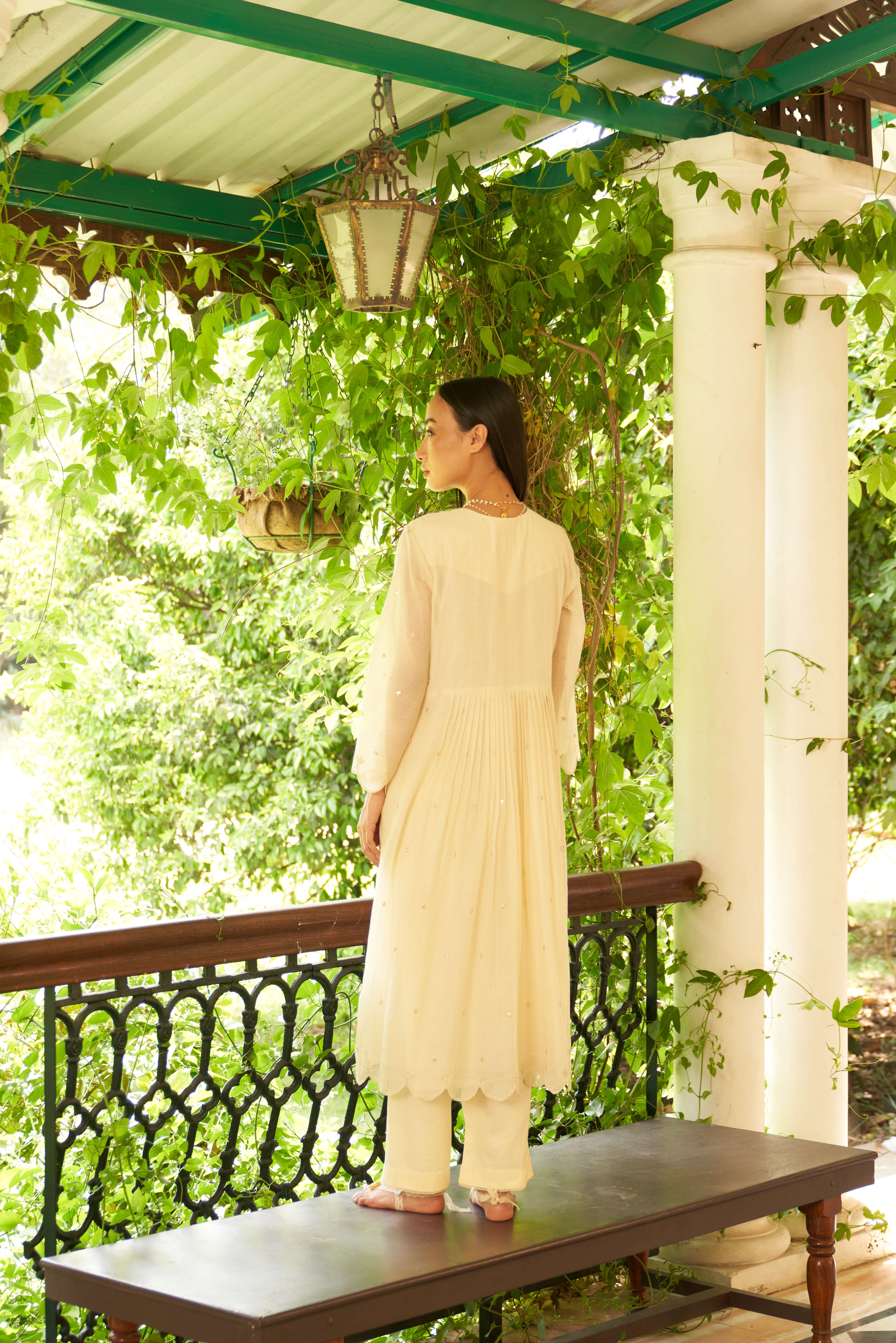 A model showcasing Bella Ivory Blush Kurta Suit by Nirvair from Nirvair's collection