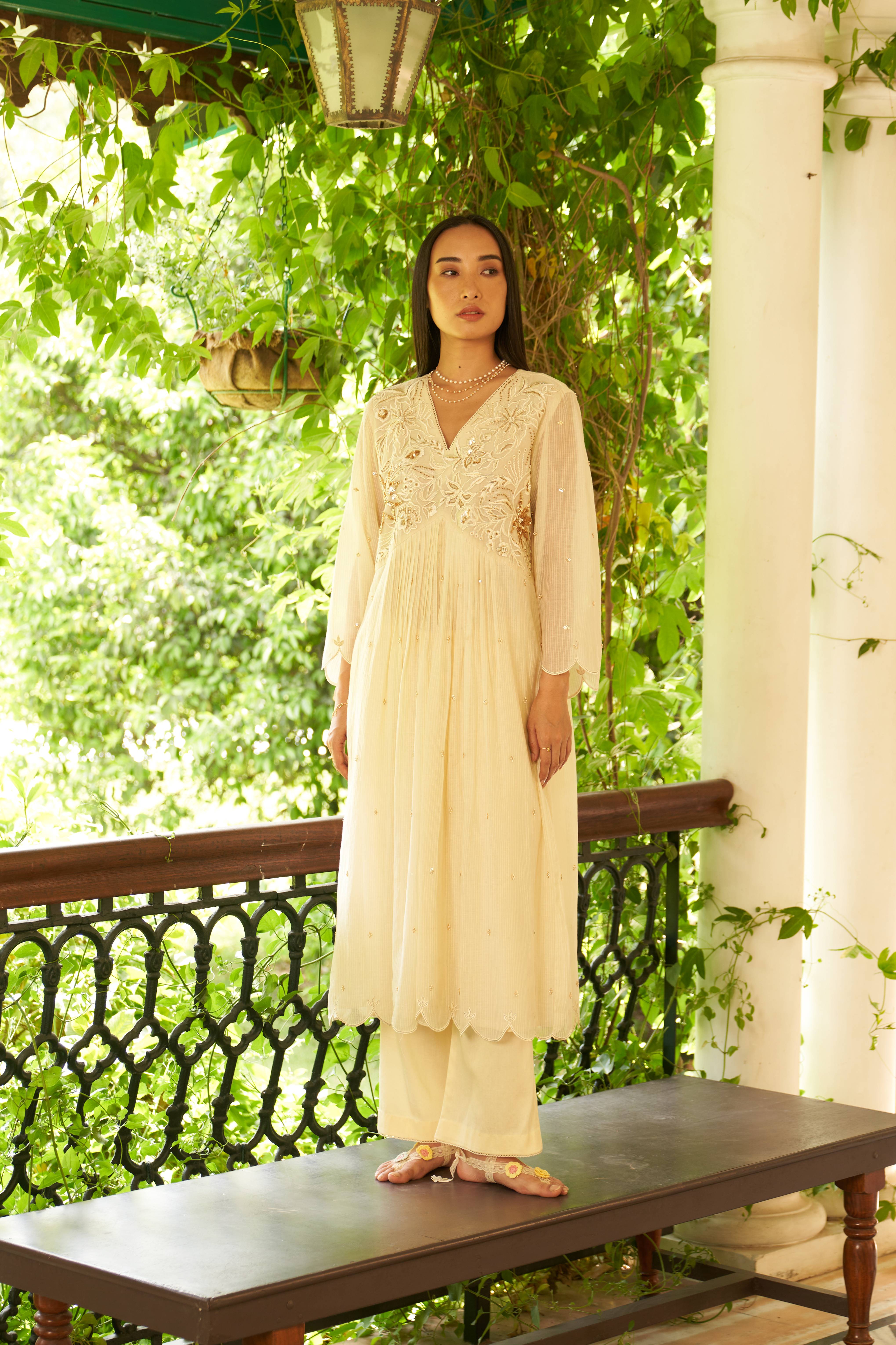 A model showcasing Bella Ivory Blush Kurta Suit Feature image by Nirvair from Nirvair's collection