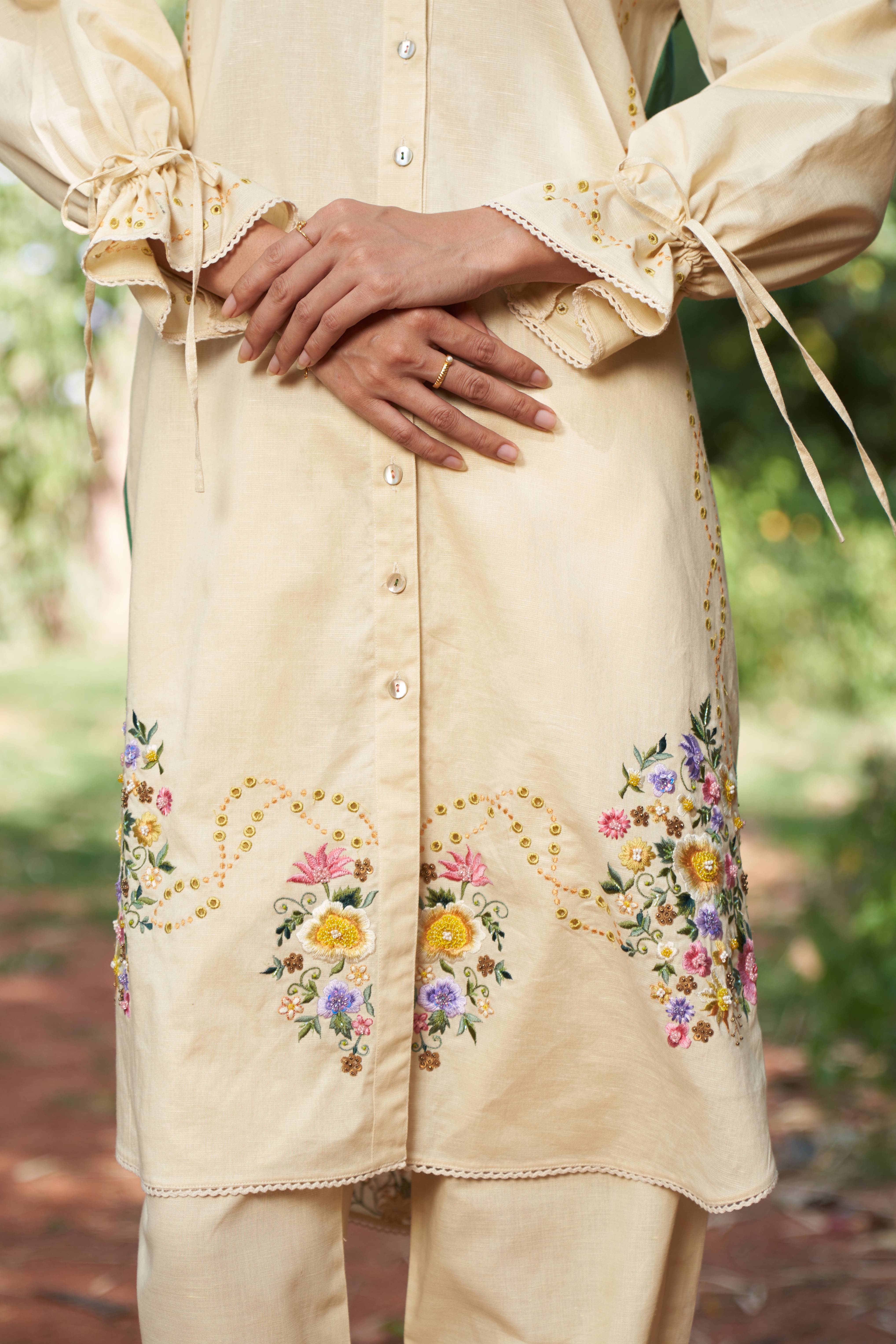A model showcasing Dahlia Kurta With Pants by Nirvair from Nirvair's collection