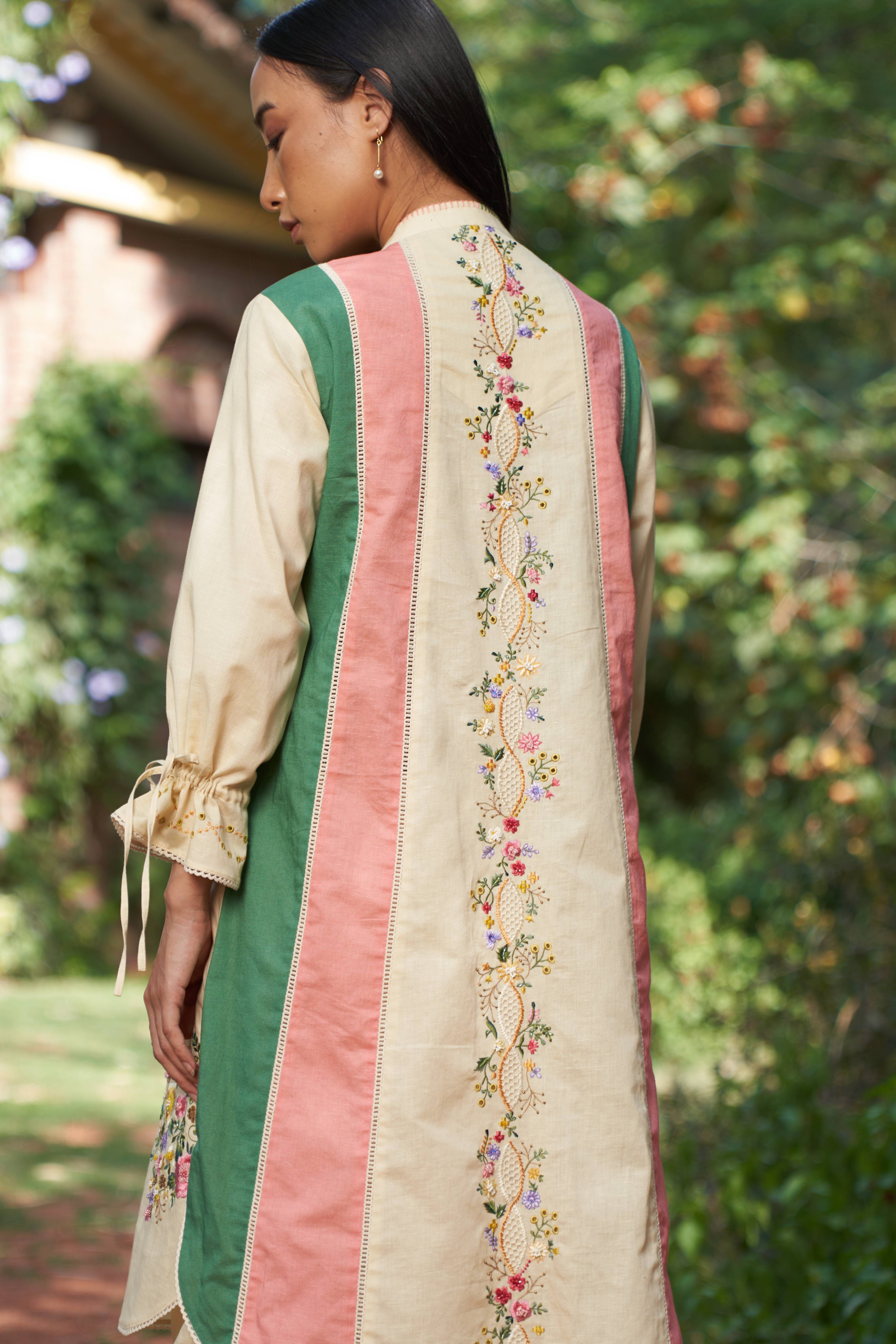 A model showcasing Dahlia Kurta With Pants by Nirvair from Nirvair's collection