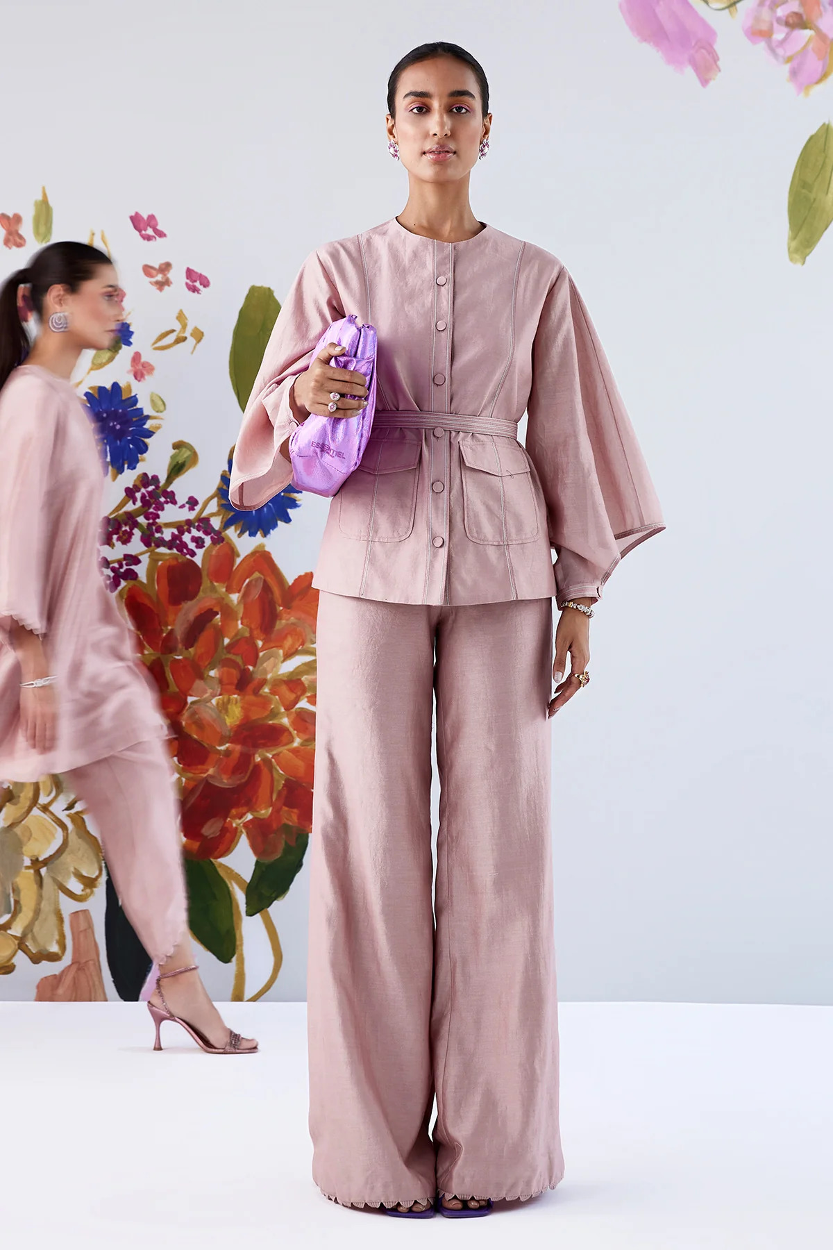 A model showcasing Palesa Blush Pink Coord Set by Ridhi Mehra from Ridhi Mehra's collection A model showcasing Palesa Blush Pink Coord Set by Ridhi Mehra from Ridhi Mehra's collection