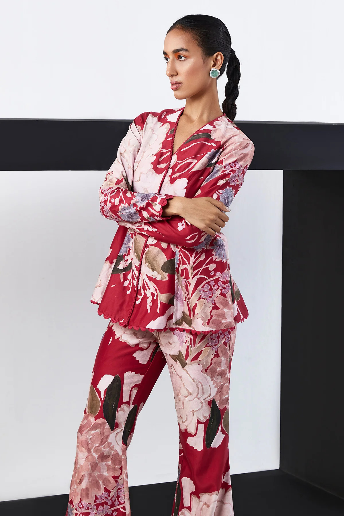 A model showcasing Varda Red Chanderi Coord Set by Ridhi Mehra from Ridhi Mehra's collection A model showcasing Varda Red Chanderi Coord Set by Ridhi Mehra from Ridhi Mehra's collection