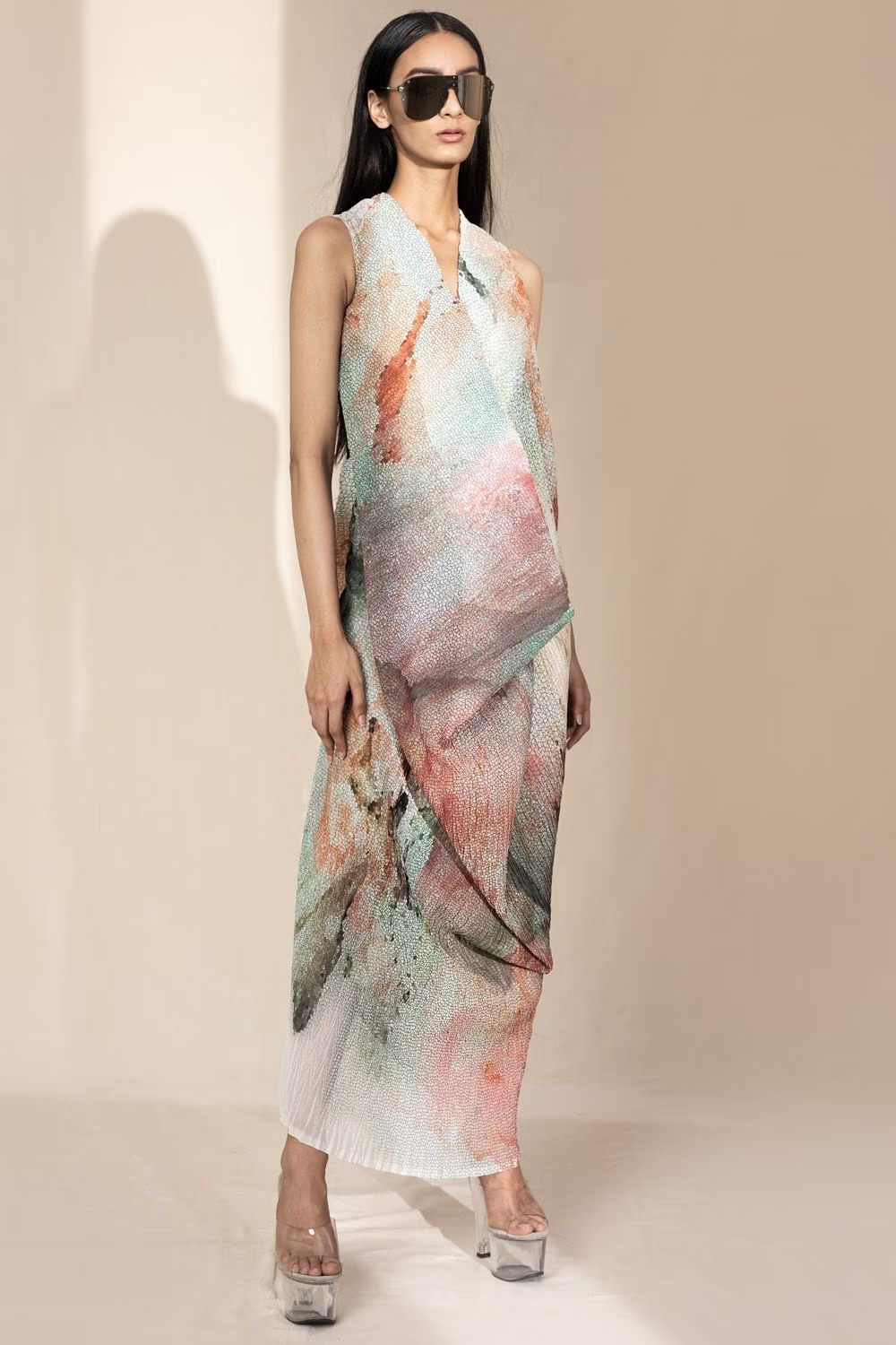 A model showcasing Crystal Patelete Draped Dress by Abhishek Sharma from Abhishek Sharma's collection A model showcasing Crystal Patelete Draped Dress by Abhishek Sharma from Abhishek Sharma's collection