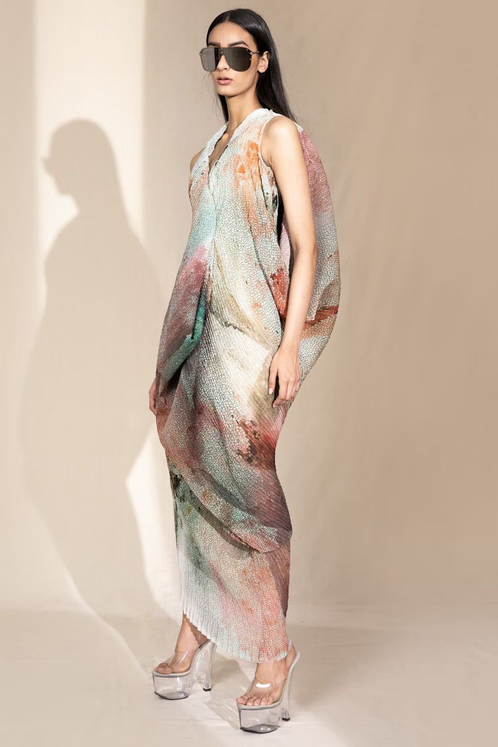 A model showcasing Crystal Patelete Draped Dress by Abhishek Sharma from Abhishek Sharma's collection A model showcasing Crystal Patelete Draped Dress by Abhishek Sharma from Abhishek Sharma's collection