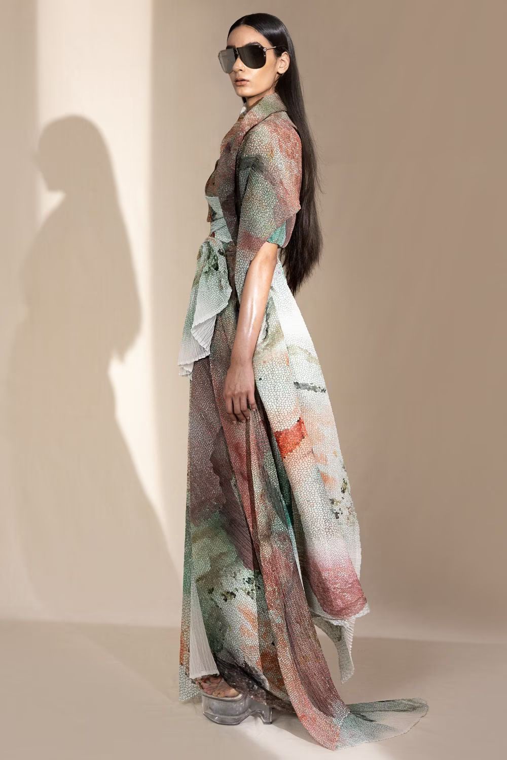 A model showcasing Crystal Patelete Printed Draped Top by Abhishek Sharma from Abhishek Sharma's collection A model showcasing Crystal Patelete Printed Draped Top by Abhishek Sharma from Abhishek Sharma's collection