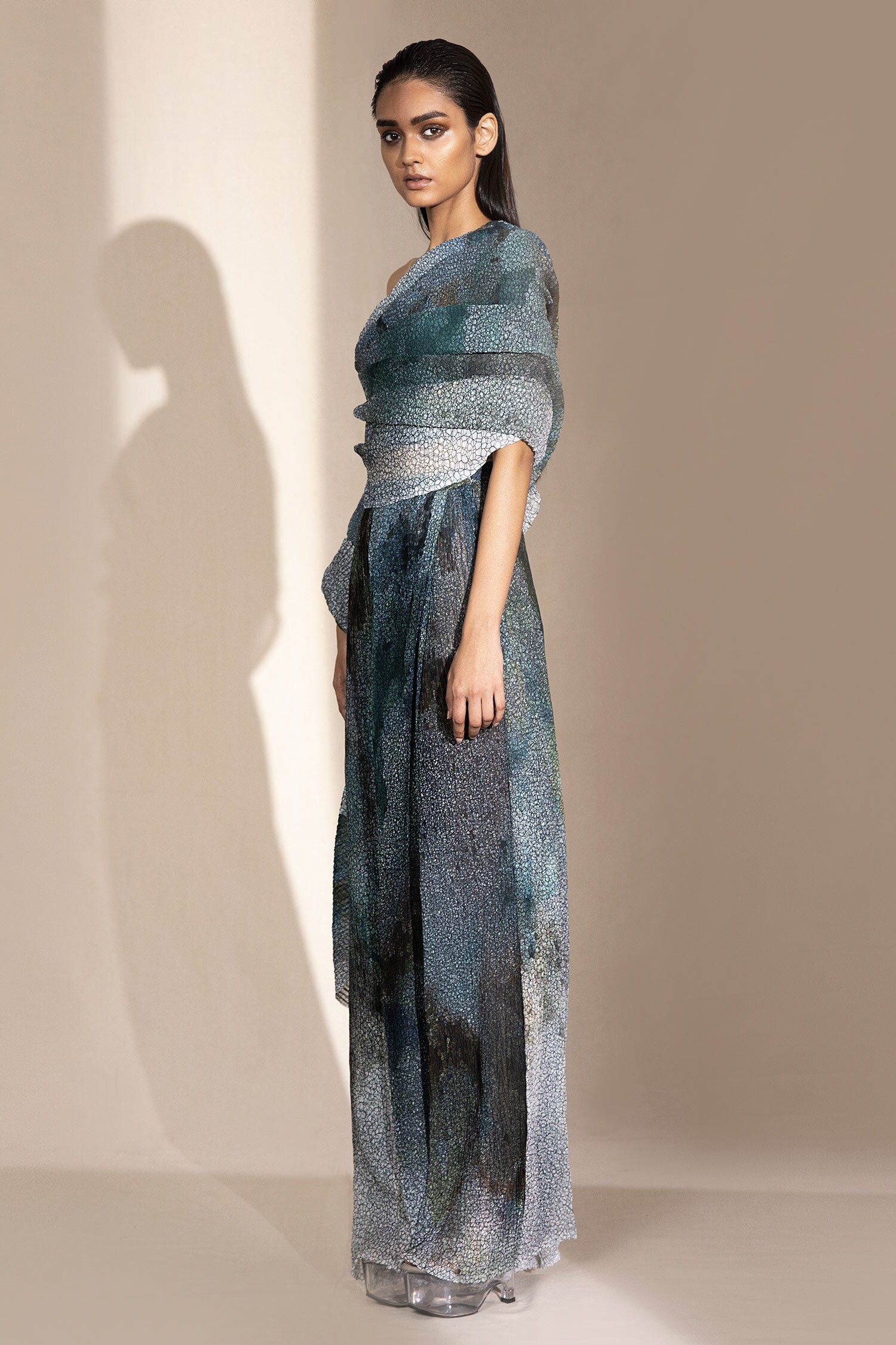 A model showcasing Georgette Print One Shoulder Top by Abhishek Sharma from Abhishek Sharma's collection A model showcasing Georgette Print One Shoulder Top by Abhishek Sharma from Abhishek Sharma's collection