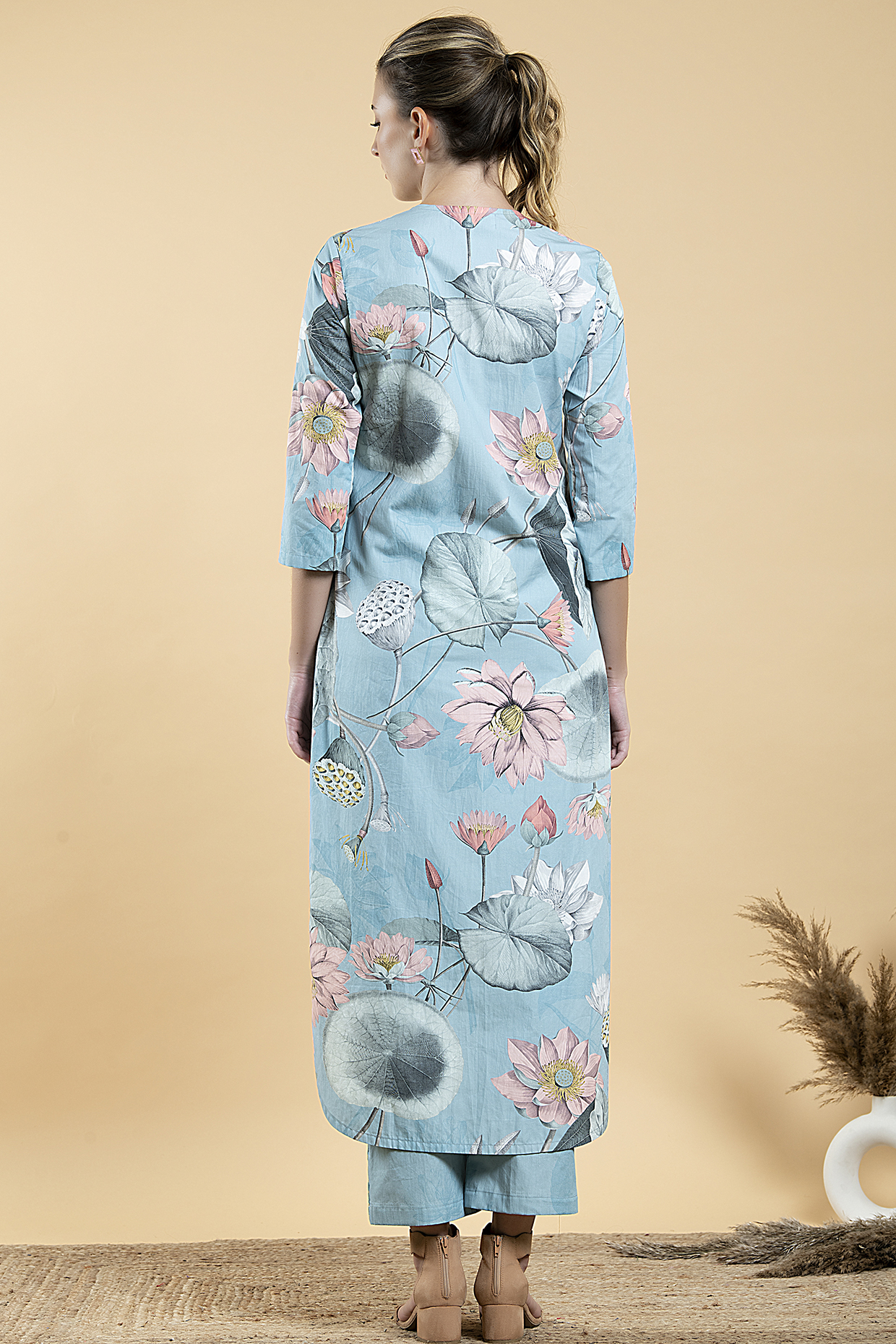 A model showcasing Sky Blue Cotton Poplin Printed Tunic Set by Divi By Sonal from Divi By Sonal's collection