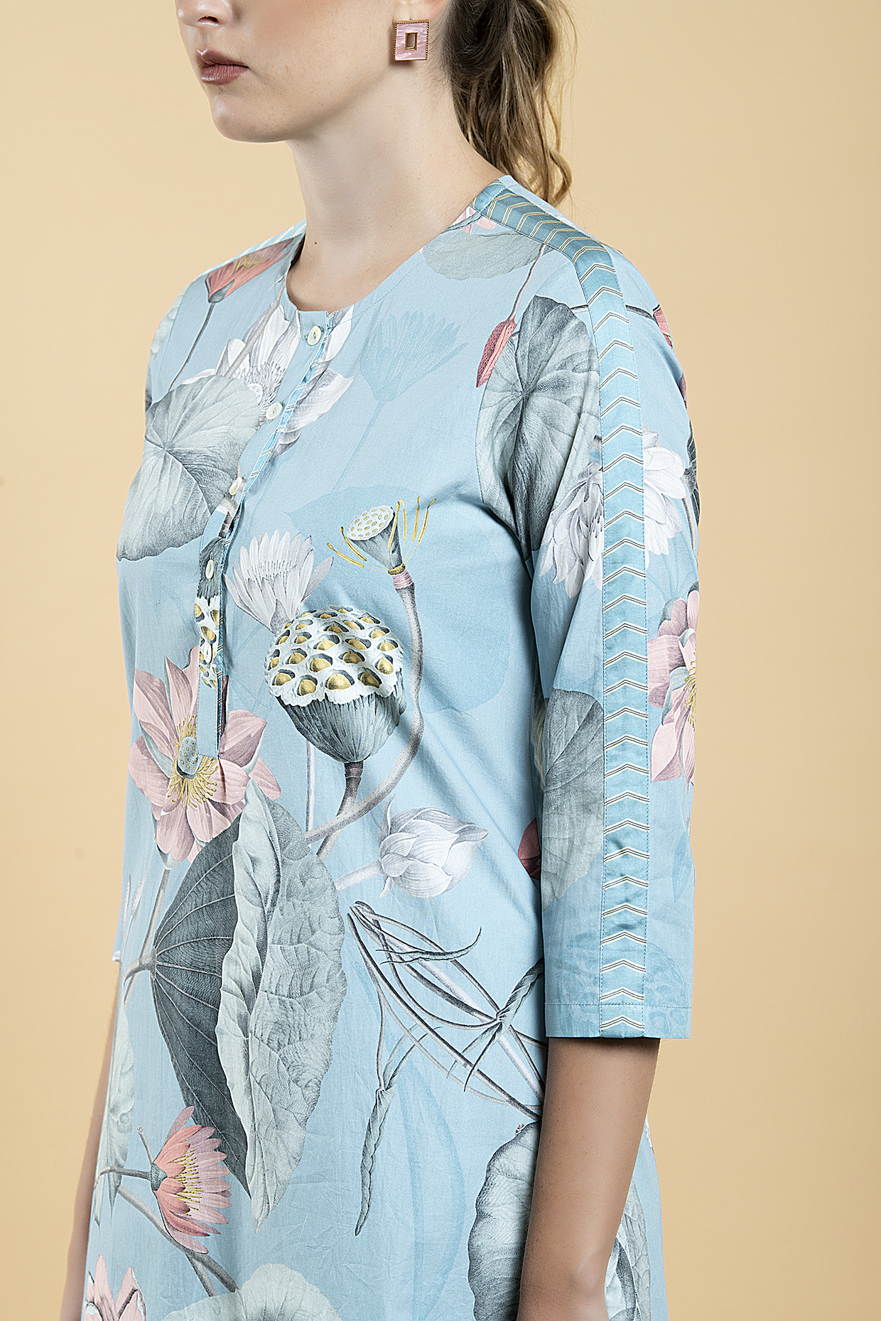 A model showcasing Sky Blue Cotton Poplin Printed Tunic Set by Divi By Sonal from Divi By Sonal's collection