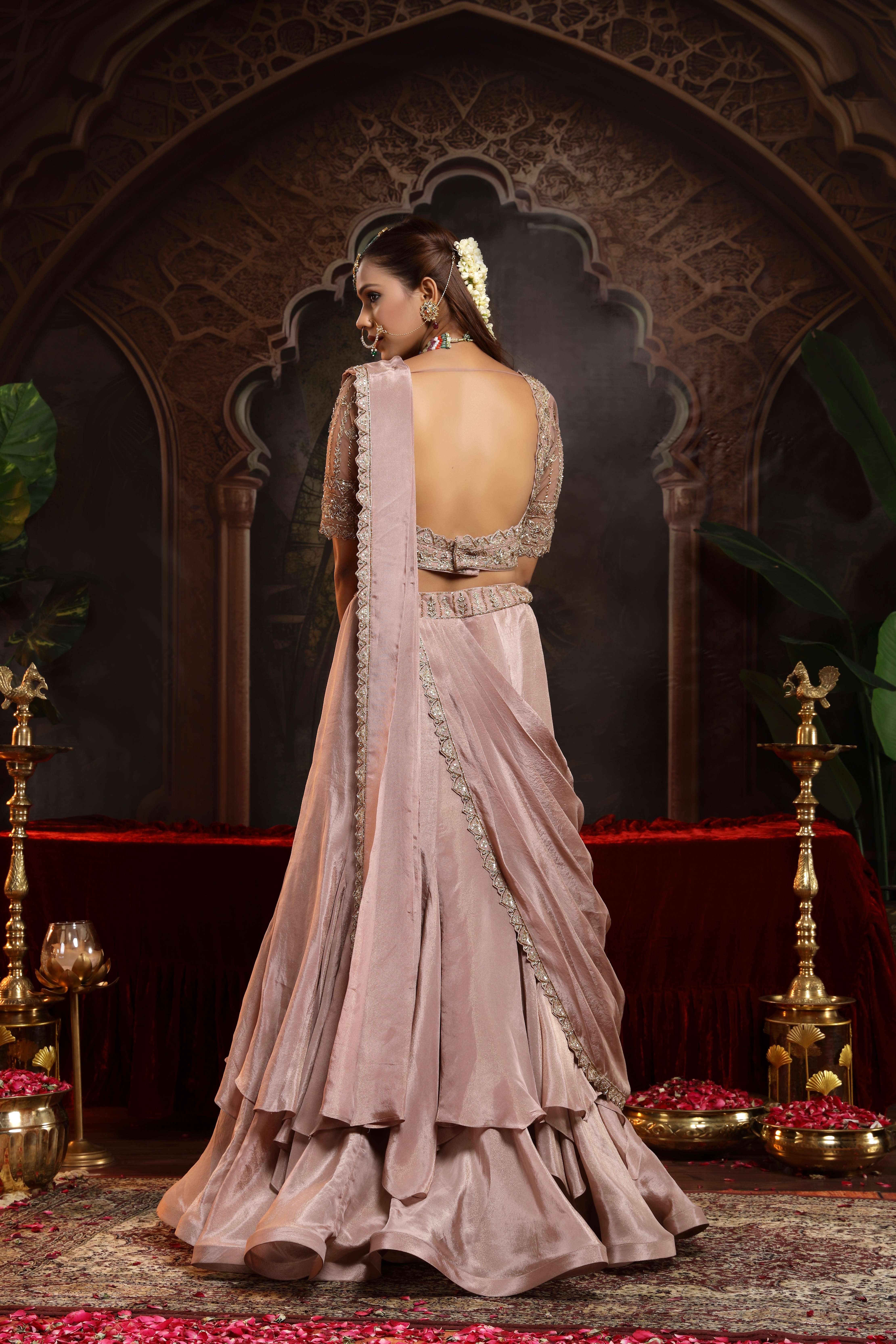 A model showcasing Keya Lilac Drape Lehenga Set by Miku Kumar from Miku Kumar's collection