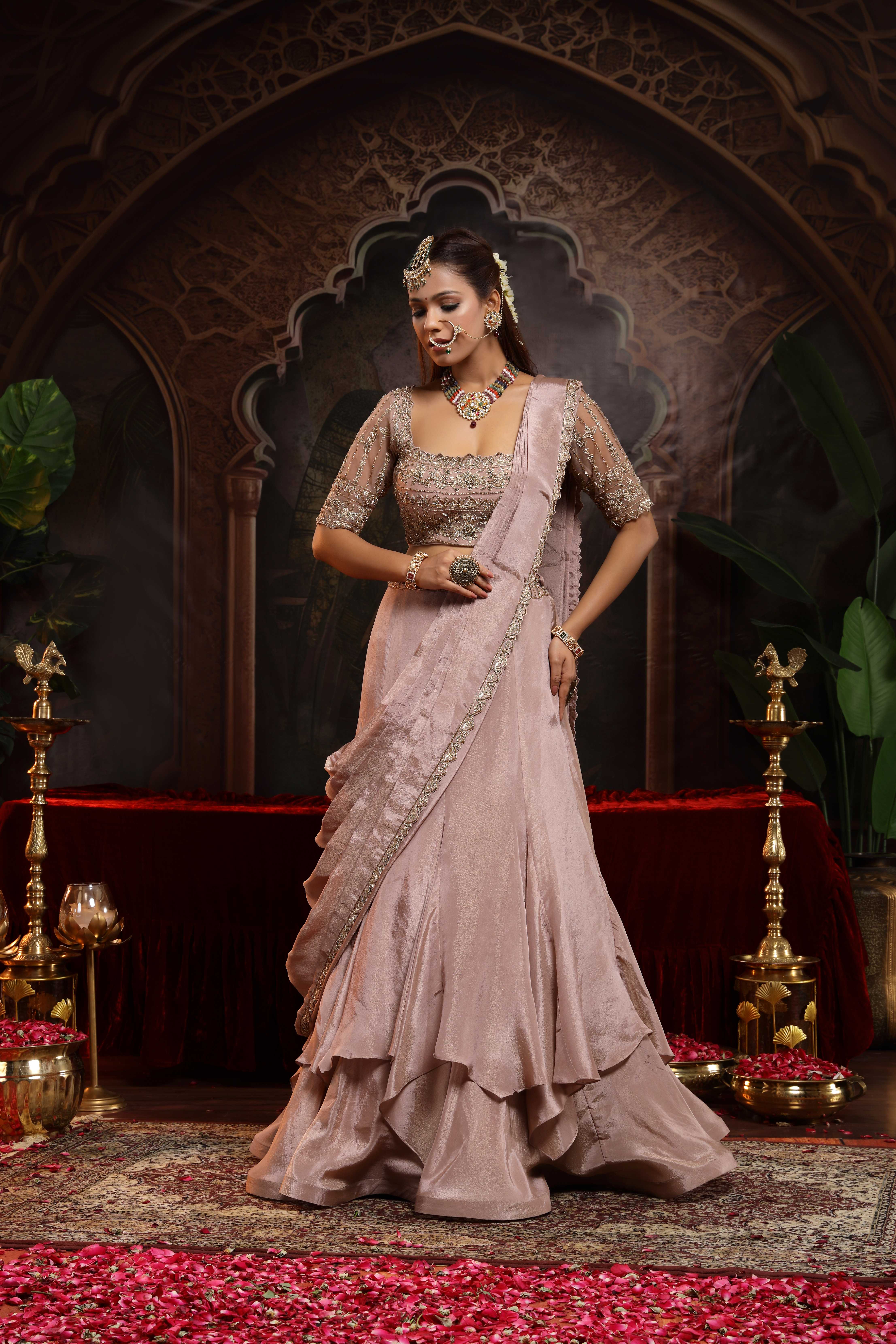 A model showcasing Keya Lilac Drape Lehenga Set by Miku Kumar from Miku Kumar's collection