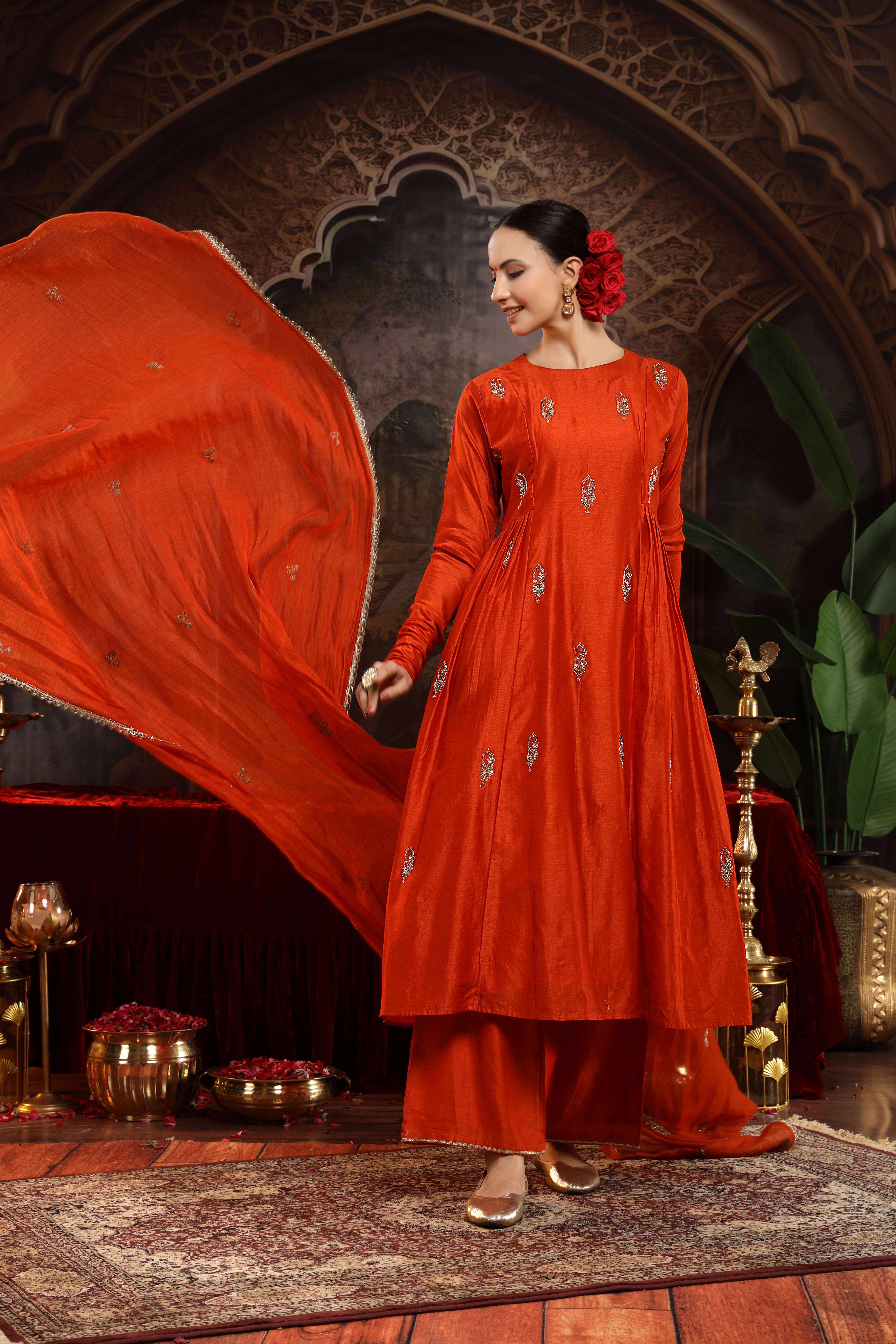 A model showcasing Kanika Chanderi Silk Suit by Miku Kumar from Miku Kumar's collection