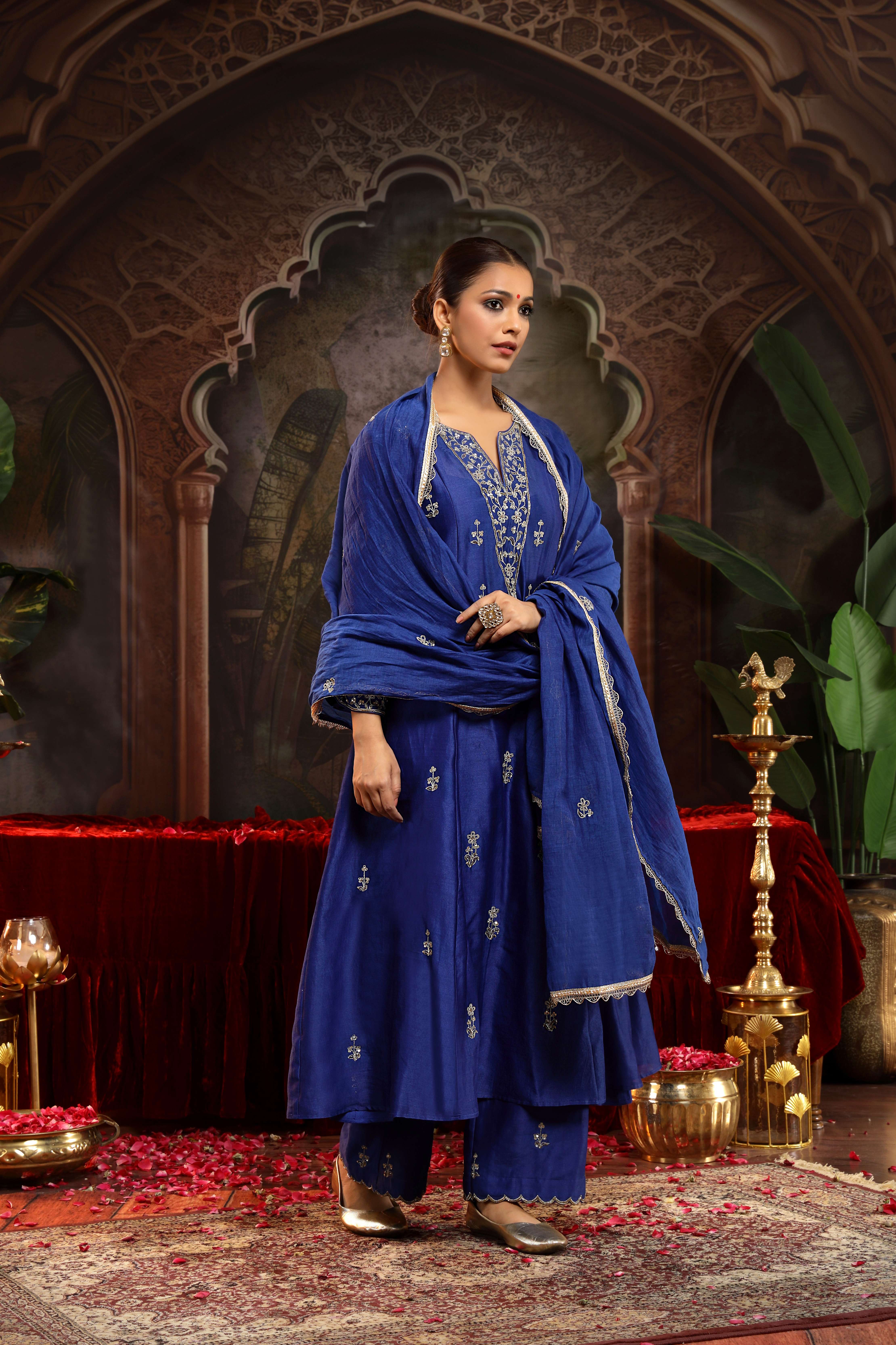 A model showcasing Tanirika Blue Chanderi Silk Suit by Miku Kumar from Miku Kumar's collection
